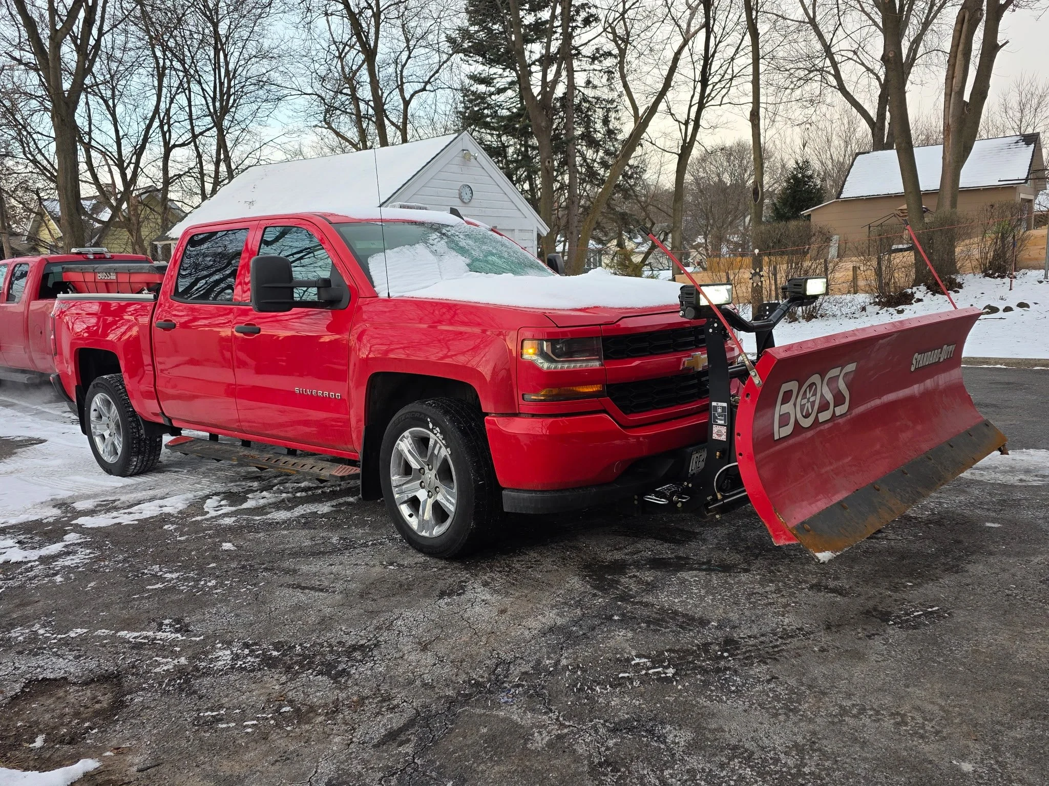 Damiani's Snow Plow Red Light Duty Truck of Company Truck Fleet