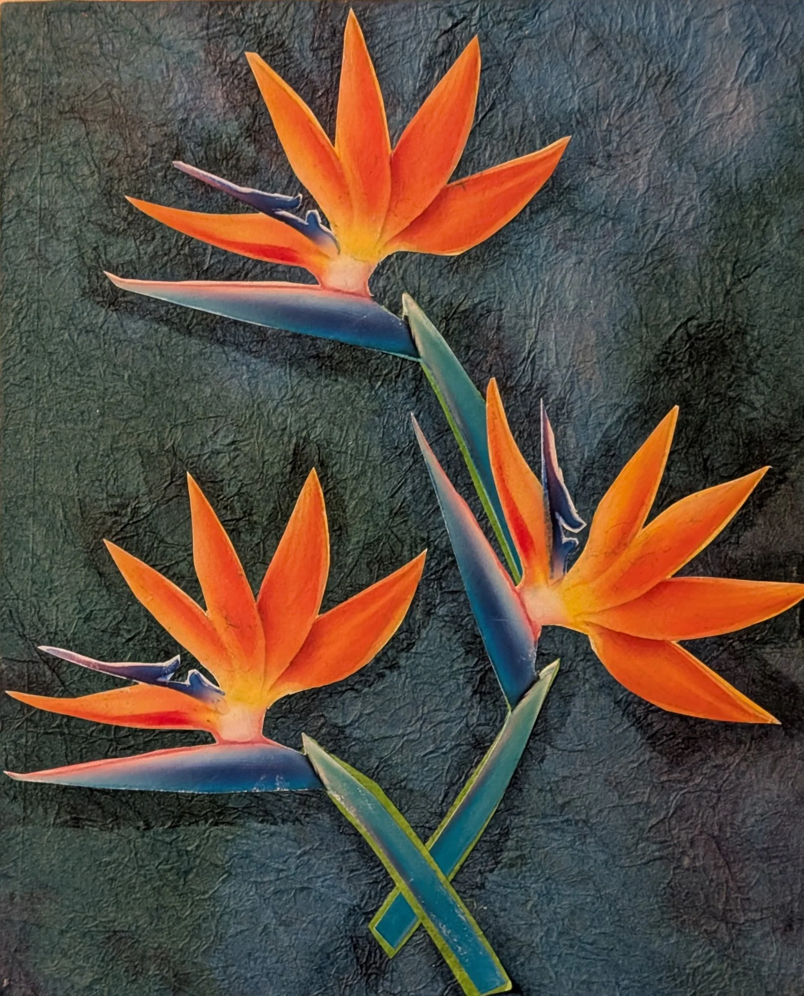 His Favorite Flower is an 8x10 mixed media collage on board created as a tribute to my partner of four years, who passed away. He was from California, and the Bird of Paradise was his favorite flower. This piece honors his memory with vibrant orange 