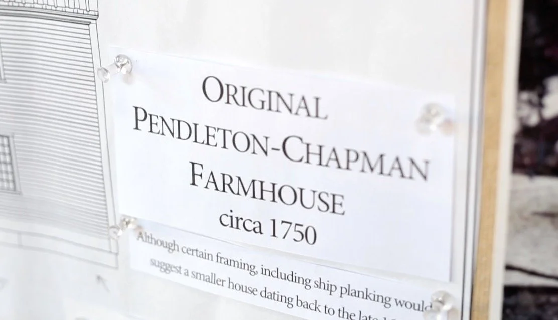 Sign indicating the original Pendleton-Chapman Farmhouse circa 1750 with some additional text.