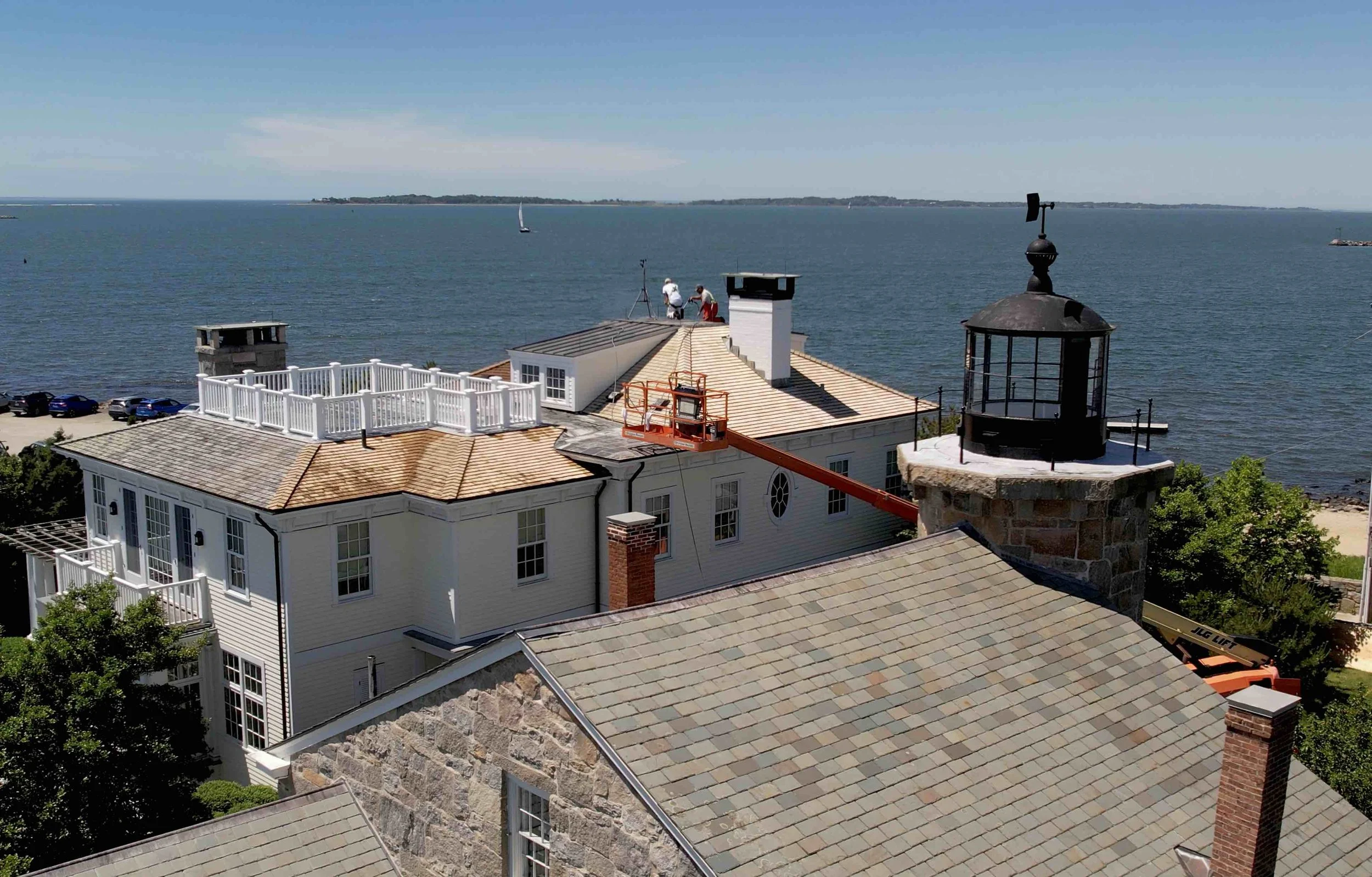 Exterior Painting and roof restoration of waterfront home in Stonington Borough, Connecticut, by Cyr Painting and Restoration
