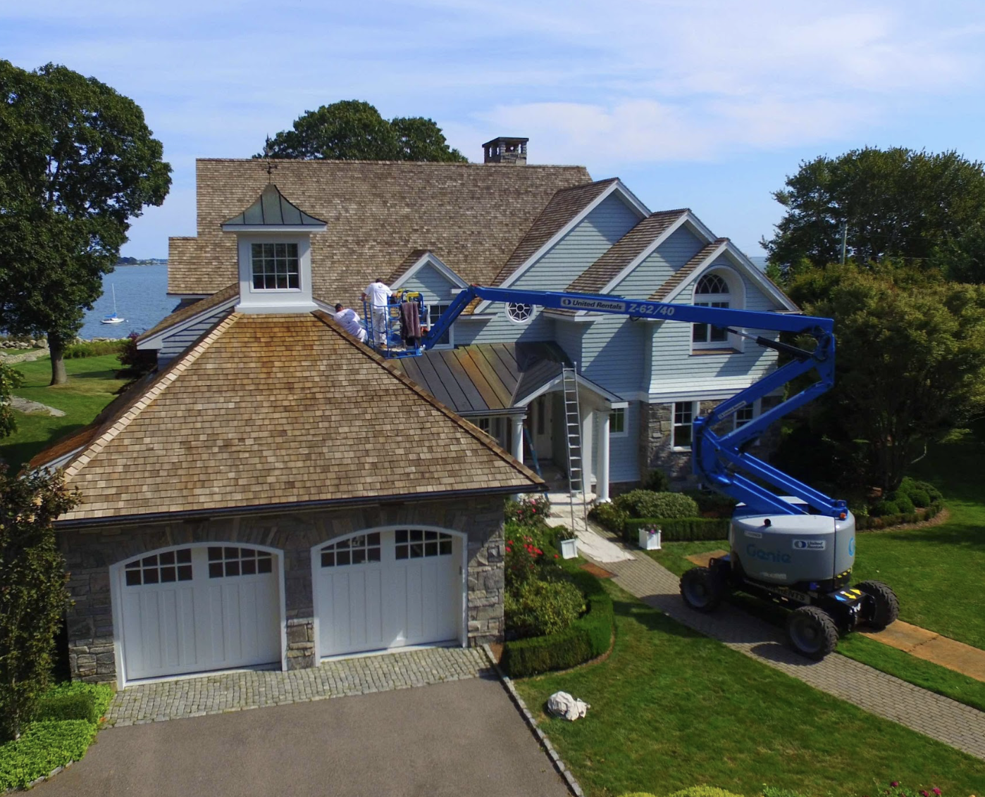 Complete exterior painting and roof wash of waterfront home in Latimer Point, Stonington, Connecticut, by Cyr Painting and Restoration