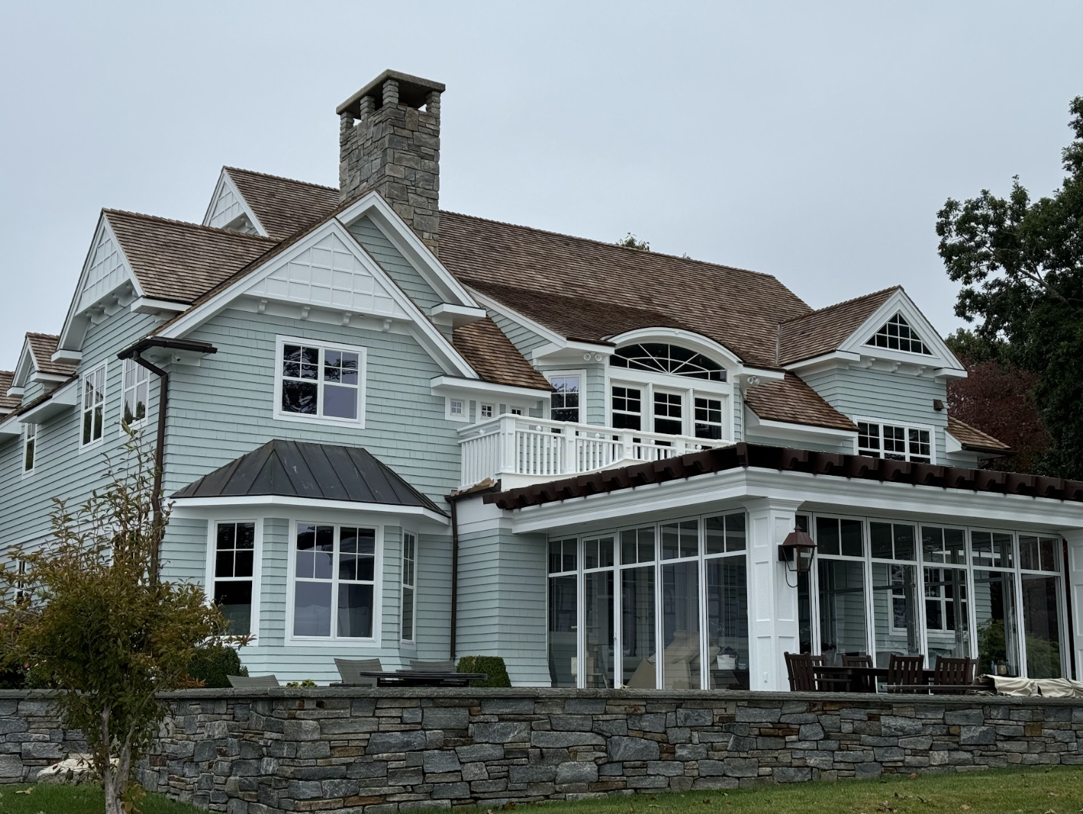 Exterior Painting of waterfront home in Latimer Point, Stonington, Connecticut, by Cyr Painting and Restoration