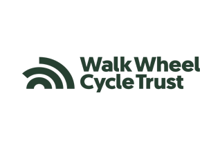 The logo of Walk Wheel Cycle Trust, featuring a stylized rainbow with three curved lines, and the organisation's name.