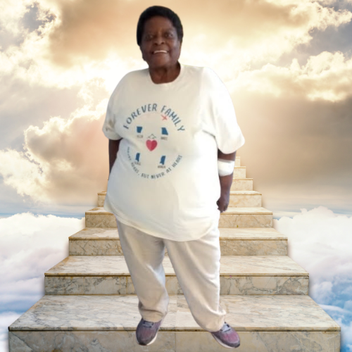 An elderly woman standing on a staircase in the sky with clouds and sunlight in the background, smiling at the camera.