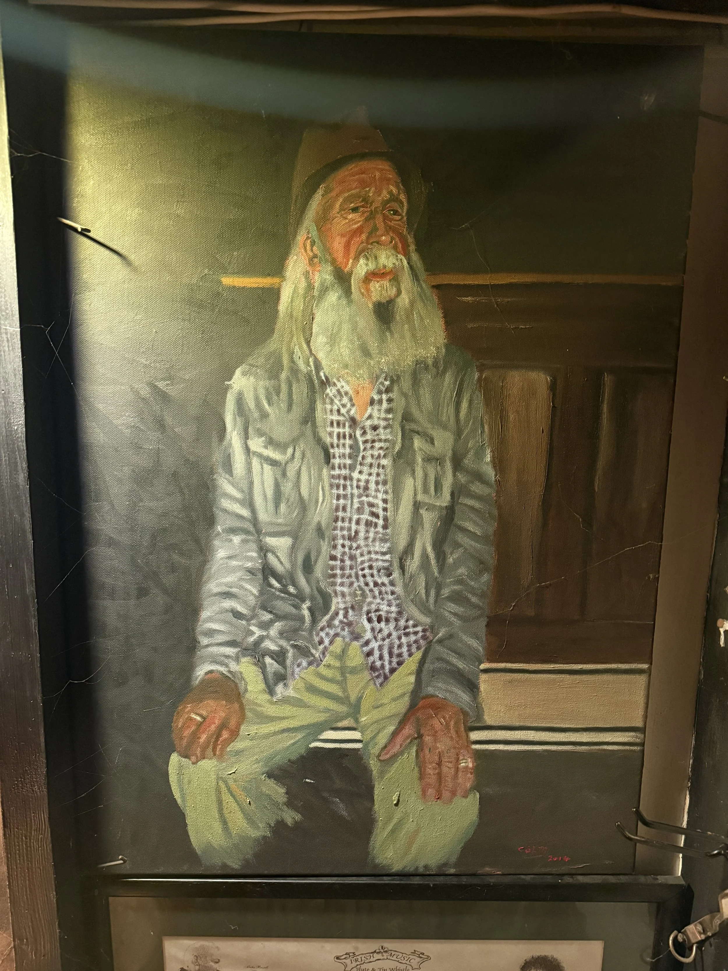 Painting of old man in bar