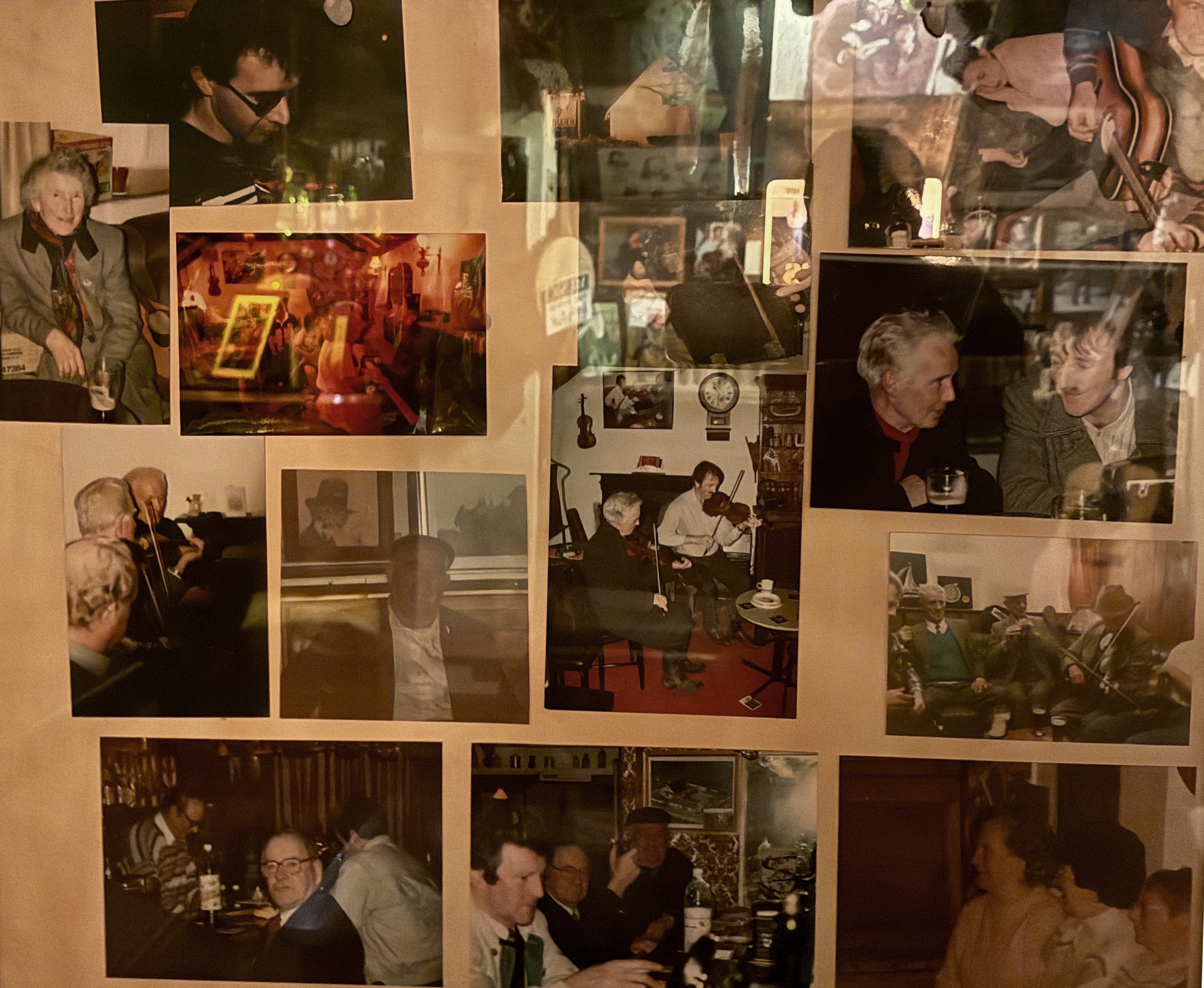 Collection of photos framed on a wall