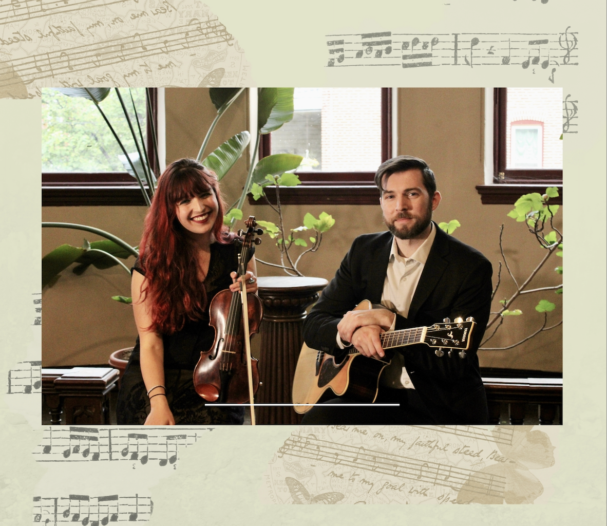 A man and woman with musical instruments sitting in a room with large windows and green plants.