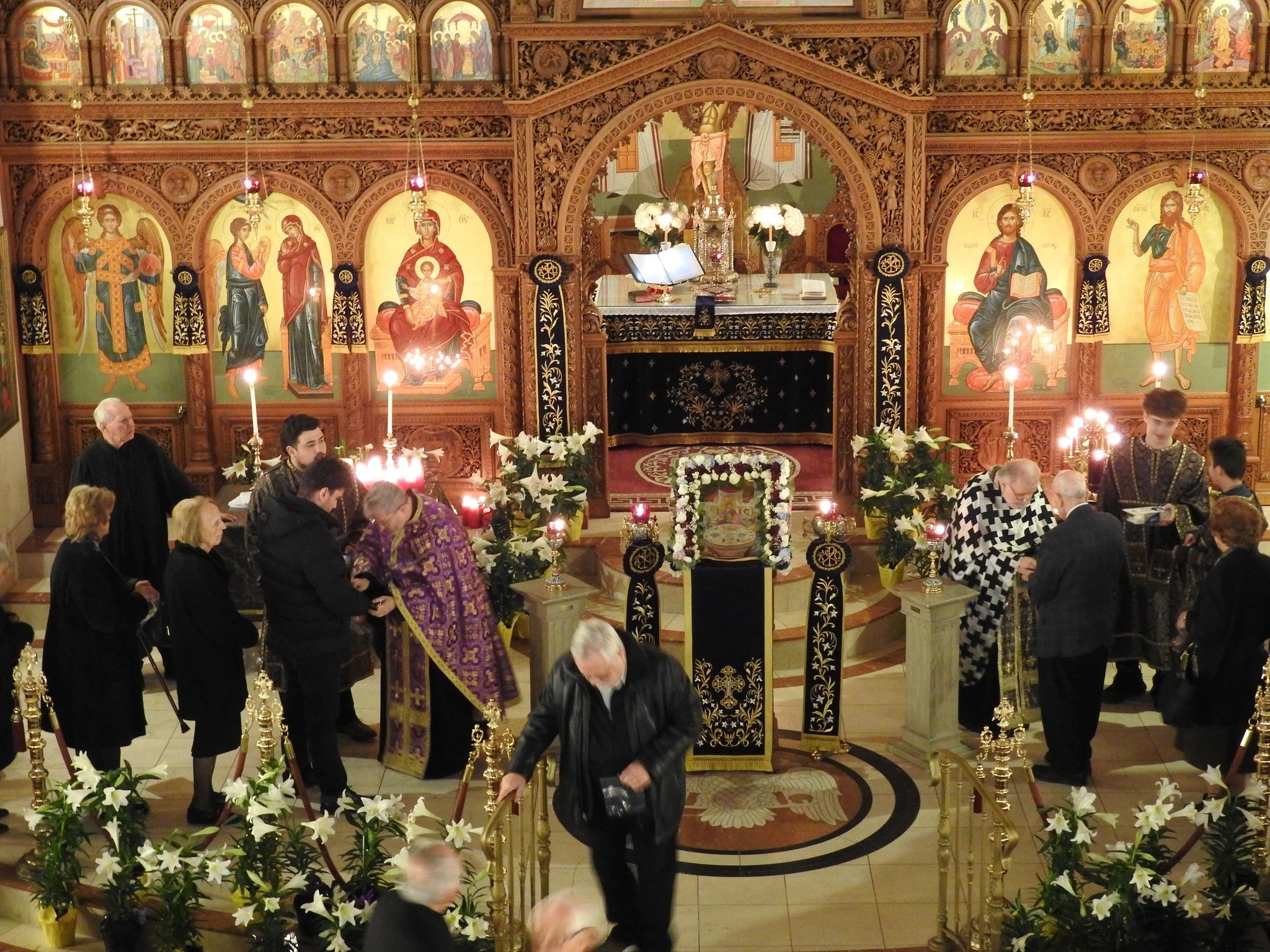 Holy Wednesday_Clergy Anointing People.jpg