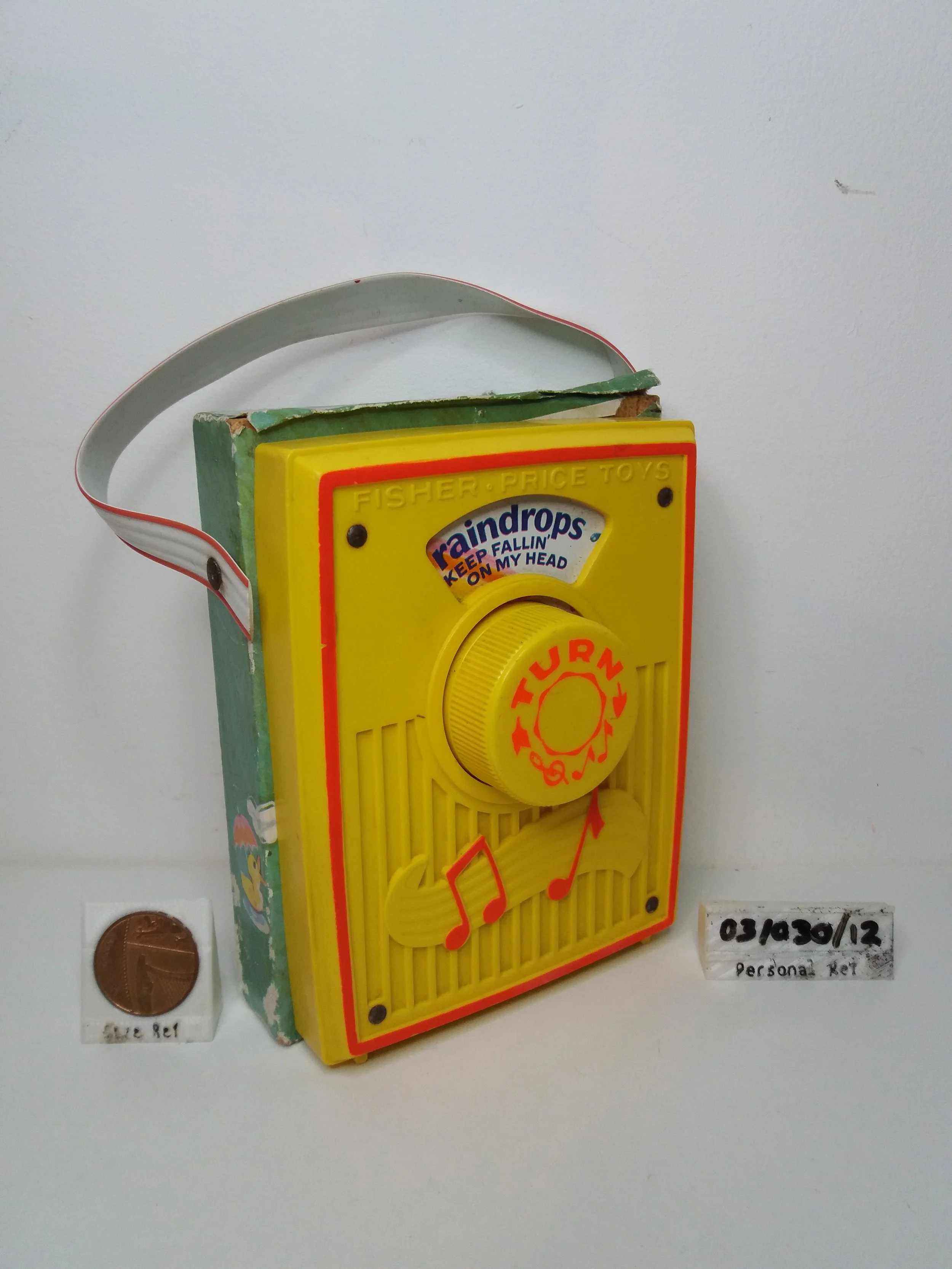 1972 - 1977 | #762 Fisher-Price Music Box Pocket Radio - Raindrops