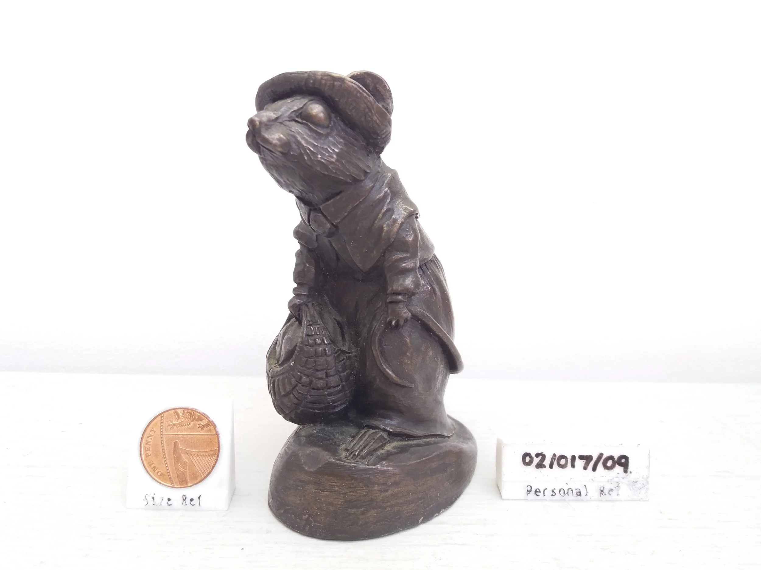 Shopping Rat Figurine (Light Damage)