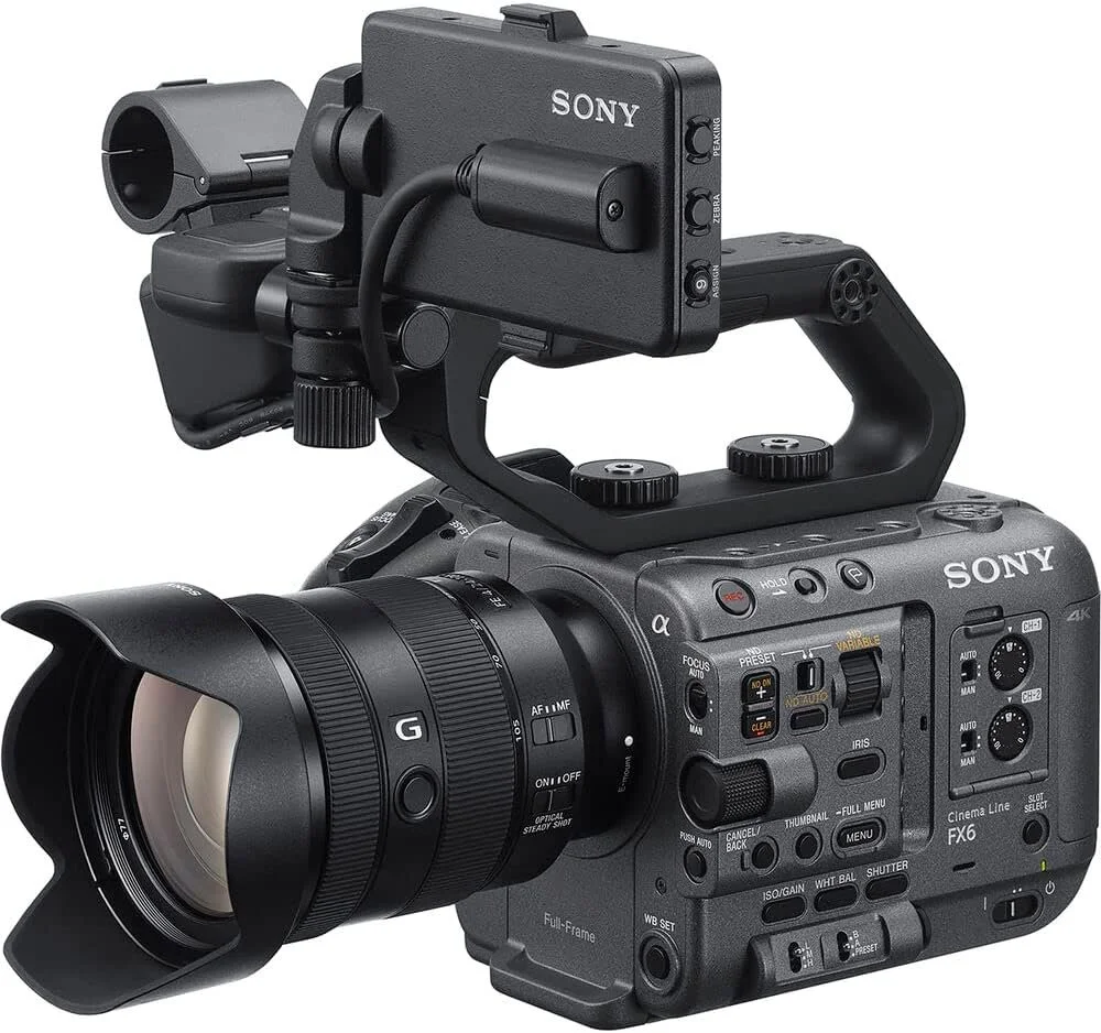 A professional Sony 4K video camera with a large lens and a mounted monitor.