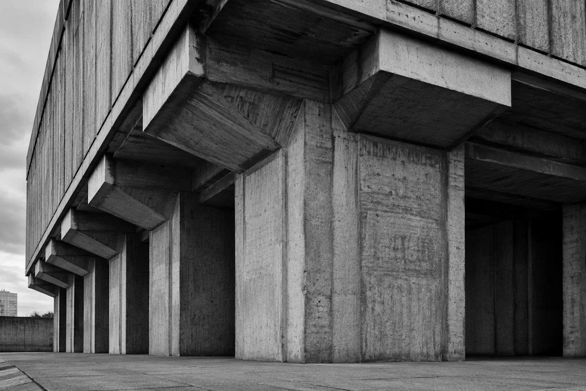 Massive load-bearing concrete columns at building foundation — assessing AI maturity in your small business