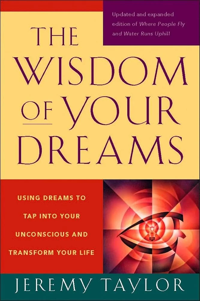 Book cover for "The Wisdom of Your Dreams" by Jeremy Taylor, featuring a yellow background, purple title text, red and black abstract eye image, purple banner with updated edition note, and author's name at the bottom.