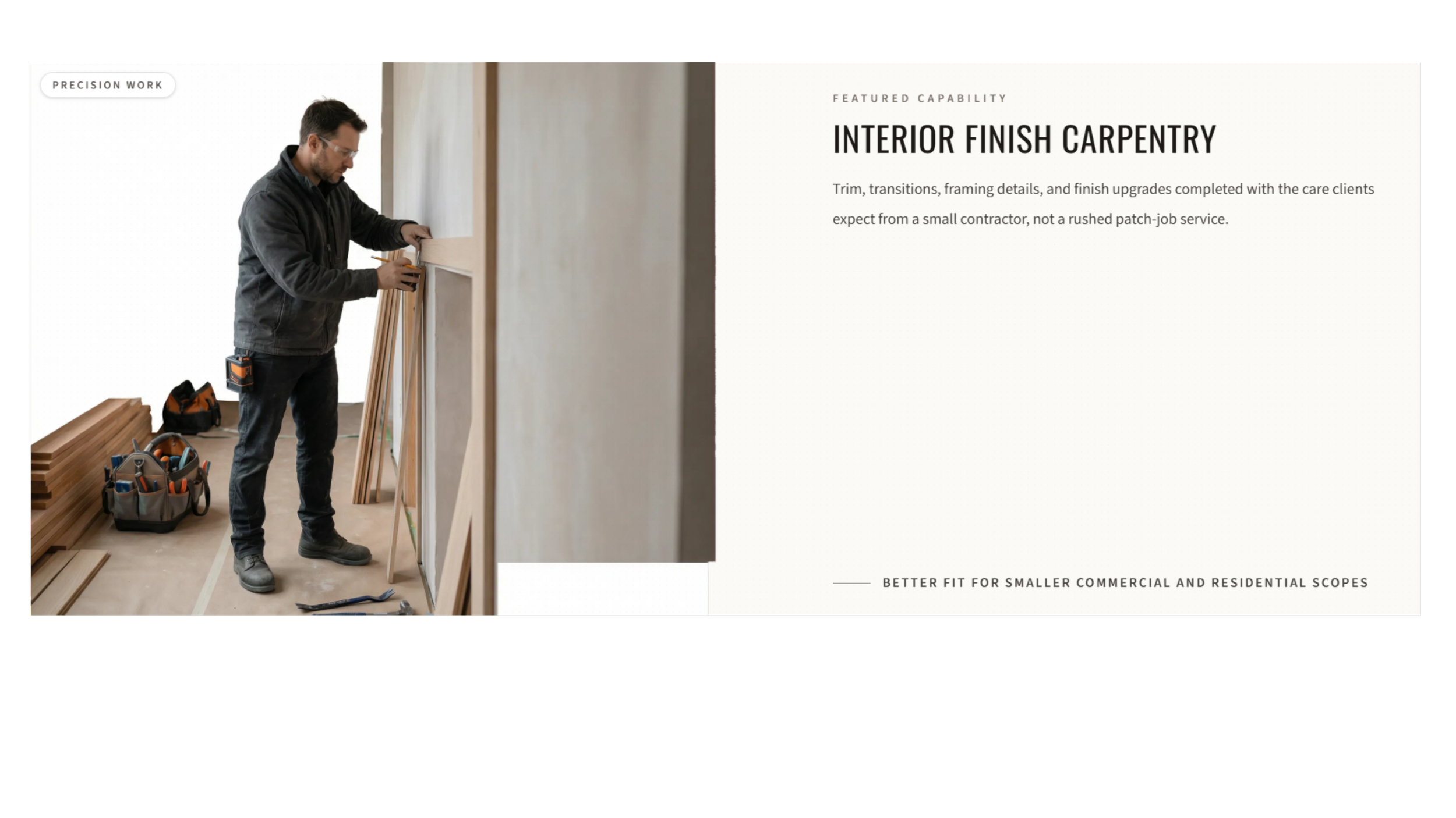 Man working on interior carpentry in a room with tools and wood pieces around him.