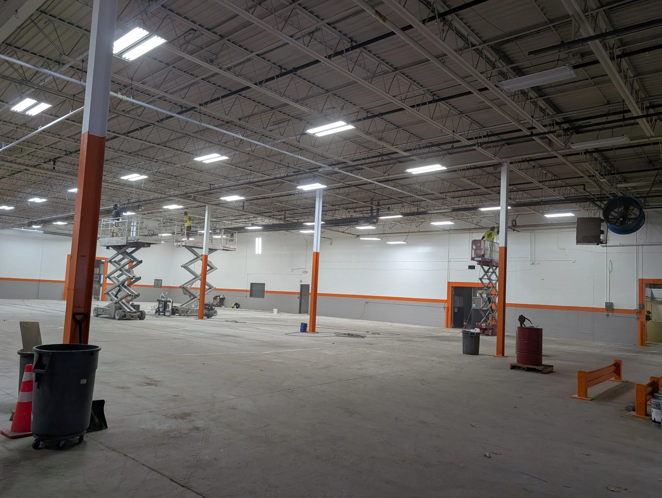 Complete Interior Restoration and Epoxy Flooring Project for Motiv