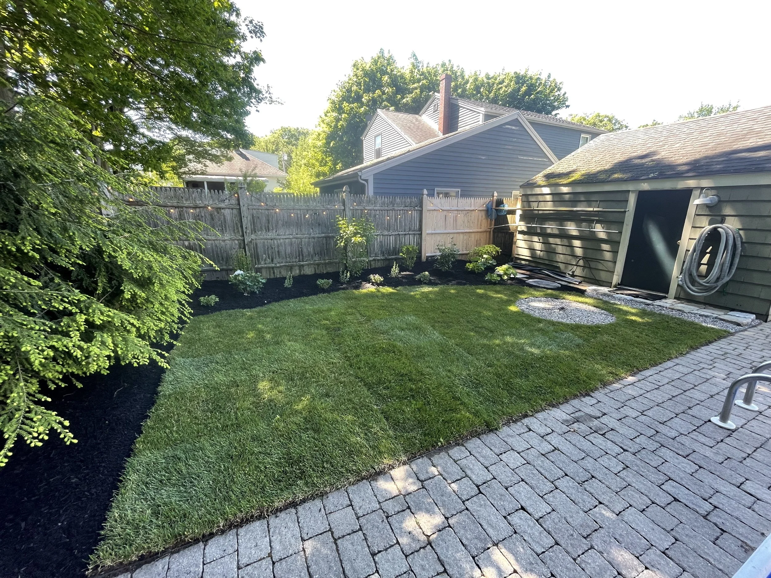 After - Complete Backyard Landscape Renovation and Sod Installation (South Portland, ME)