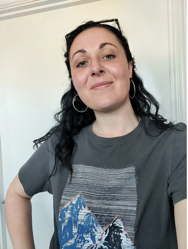 Hannah, founder and Squarespace web designer at FenViolet, smiling at the camera