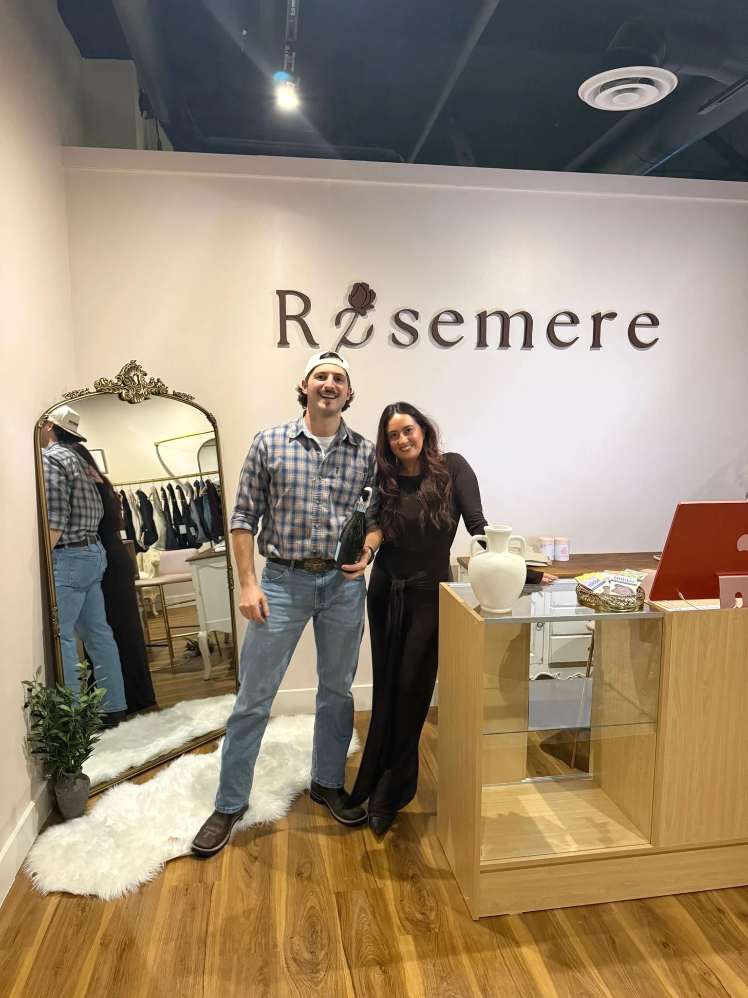 Husband and wife owners of Rosemere, a consignment boutique.