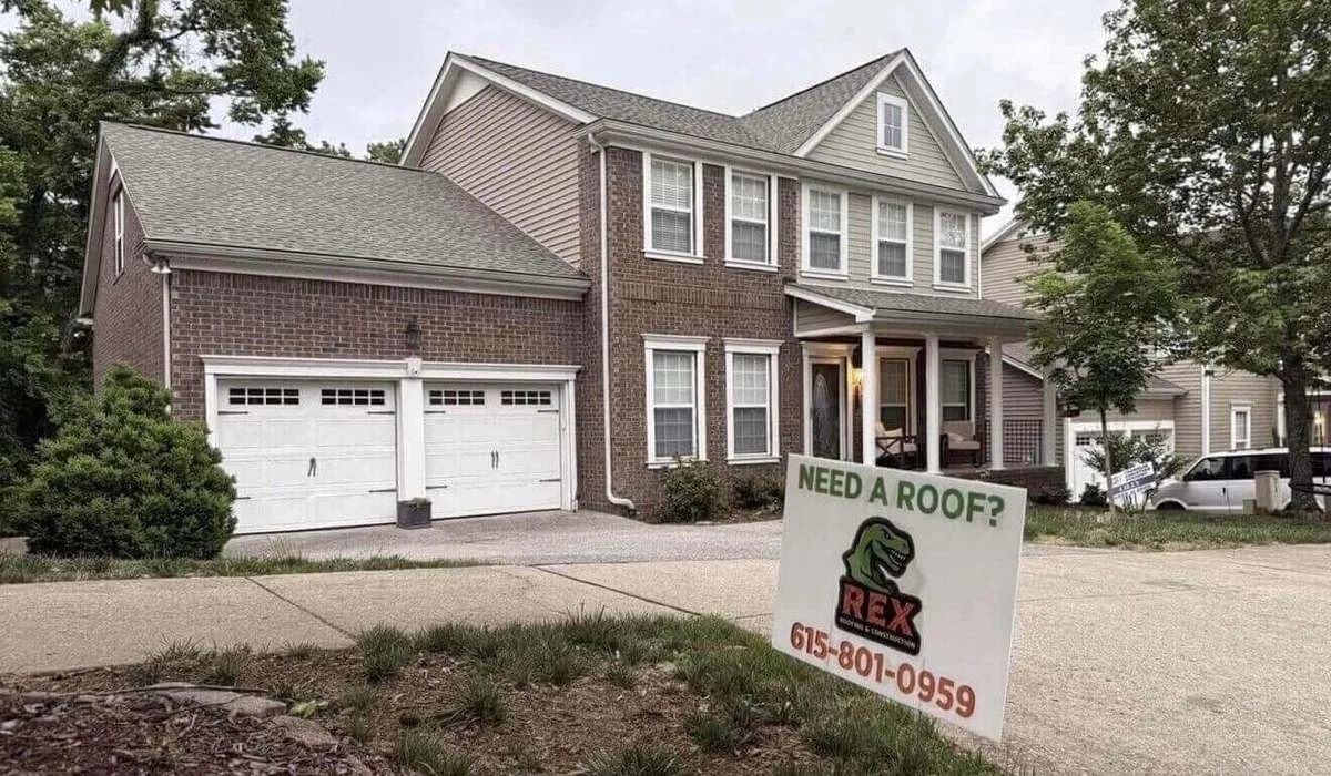 Completed roof replacement on brick two-story home in Middle Tennessee by Rex Roofing & Construction - 615-801-0959