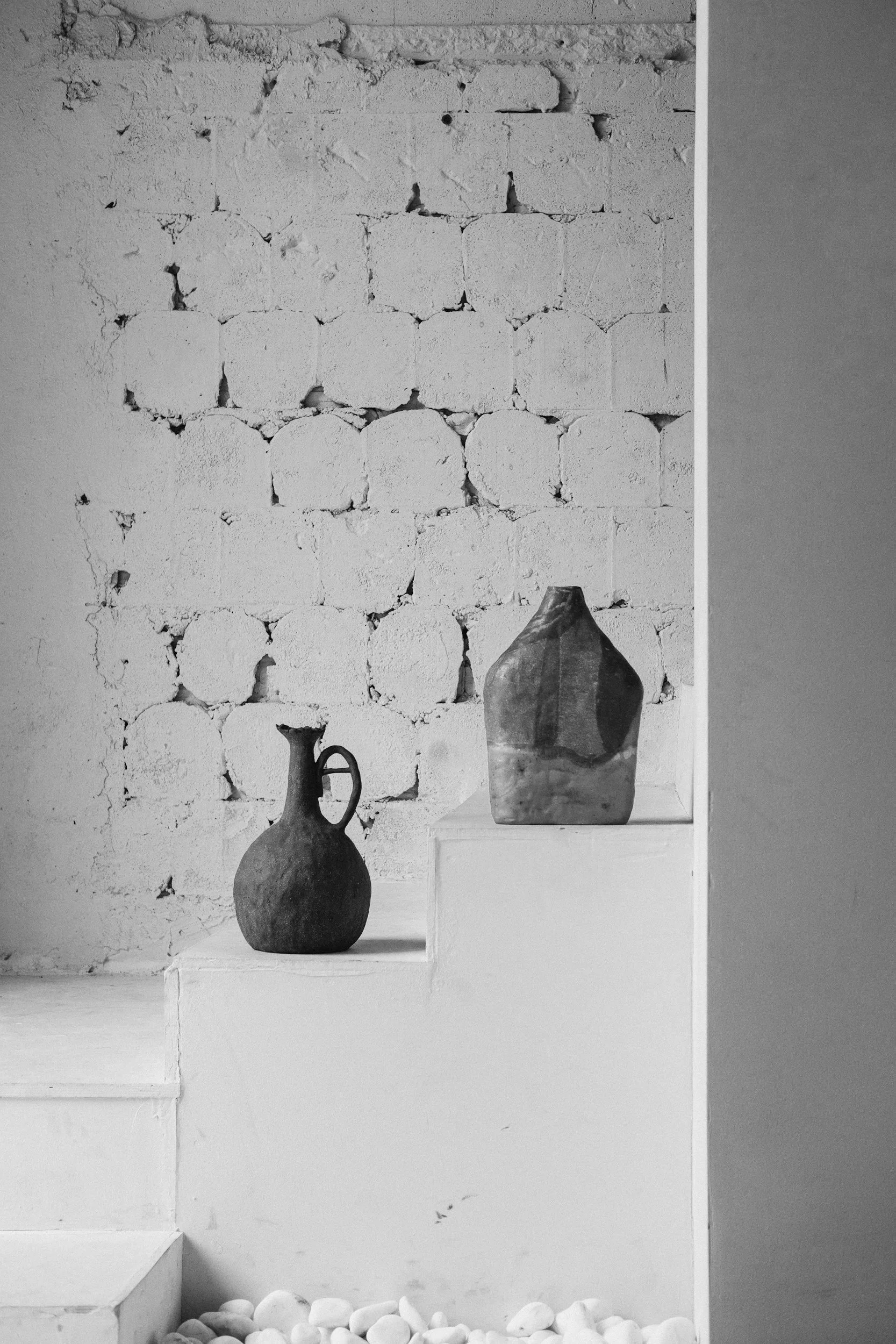 Handmade pieces arranged in a bright working studio