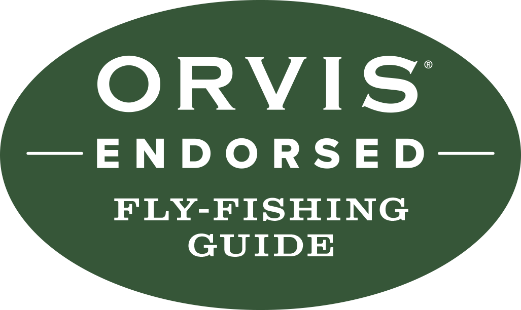 Green oval shape with white text that reads "Orvis Endorsed Fly-Fishing Guide".