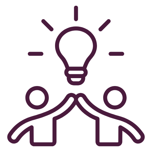 Two people joining hands beneath shared lightbulb idea