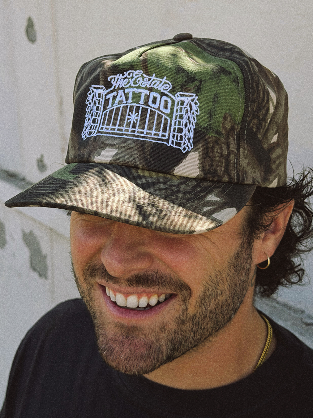 THE-ESTATE-TATTOO-CAMO-GATE-NIKO.png