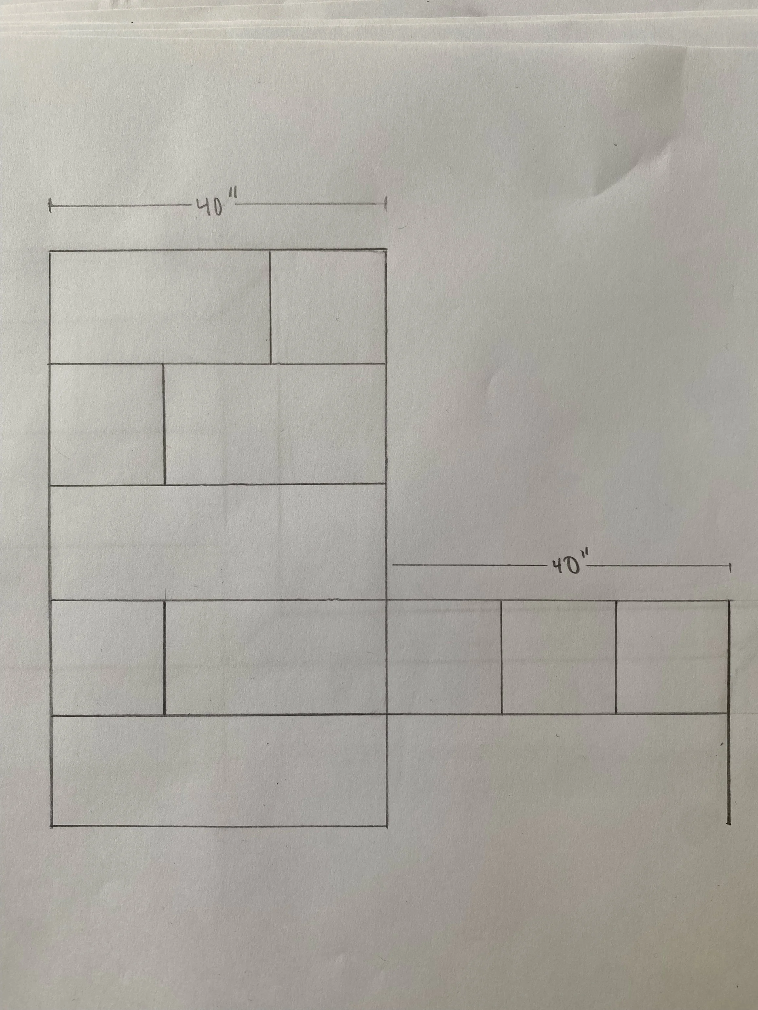 Hand-drawn layout plan of a structure with dimensions marked as 40 inches for width and height, featuring various rectangular sections.