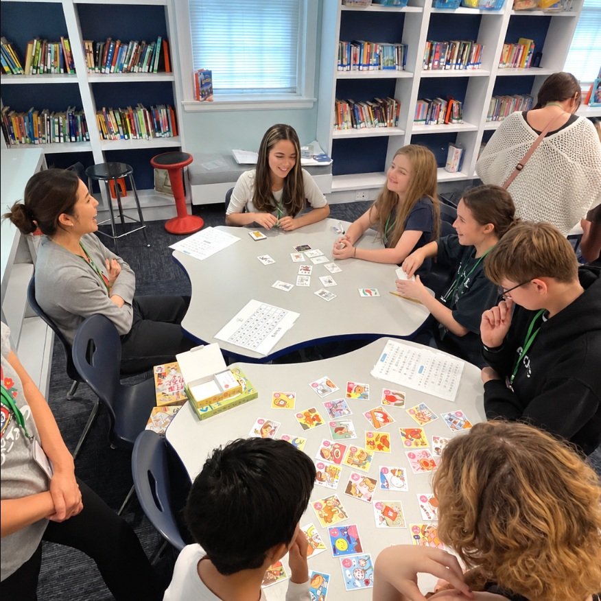 Our students are becoming more comfortable with their group projects and are really getting into their work!
Some are researching their favorite anime characters, while others are creating a poster to teach classmates who have never made onigiri how 