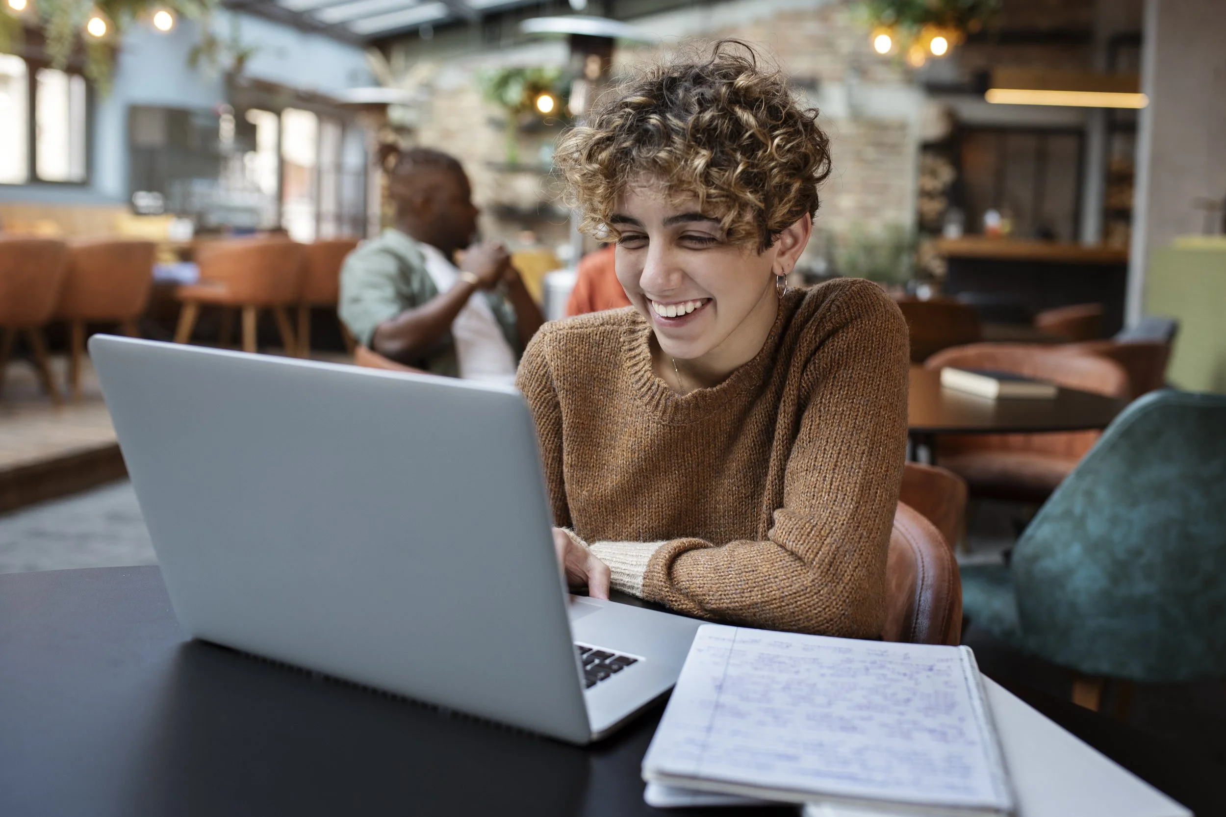 medium-shot-woman-reading-coffee-shop.jpg