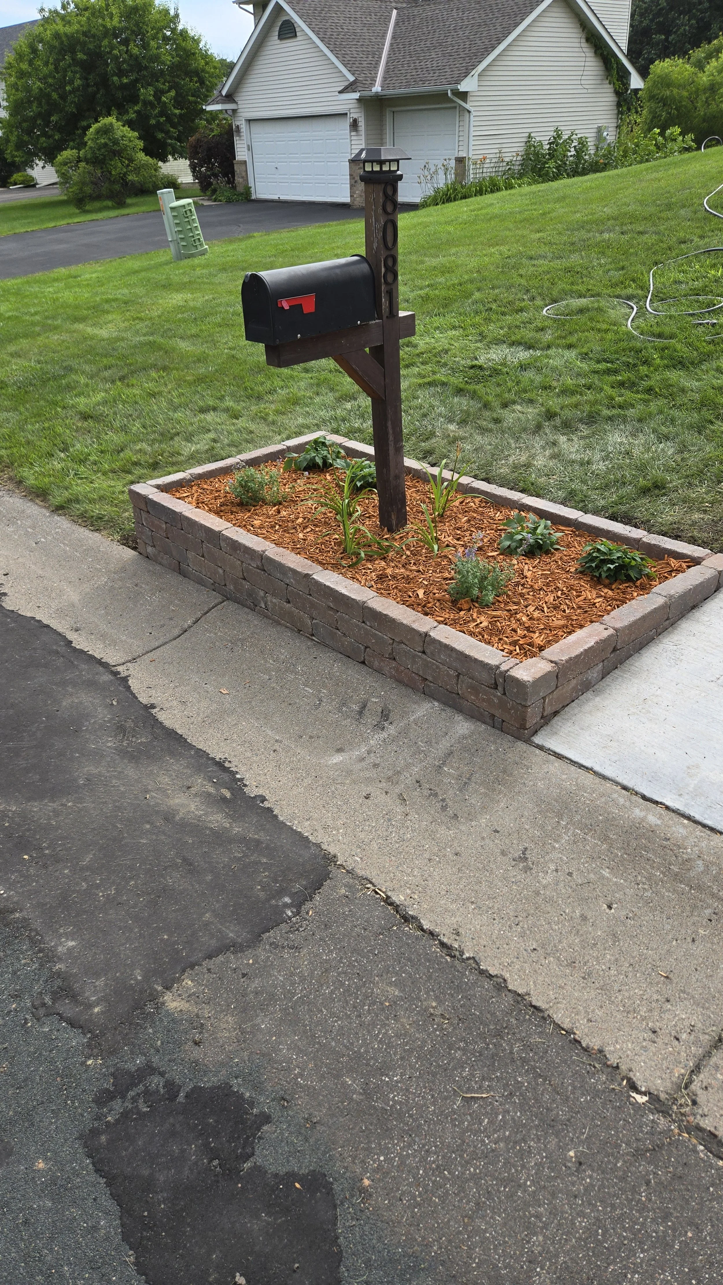 Designed And Installed A Planter Box Around The Mailbox
