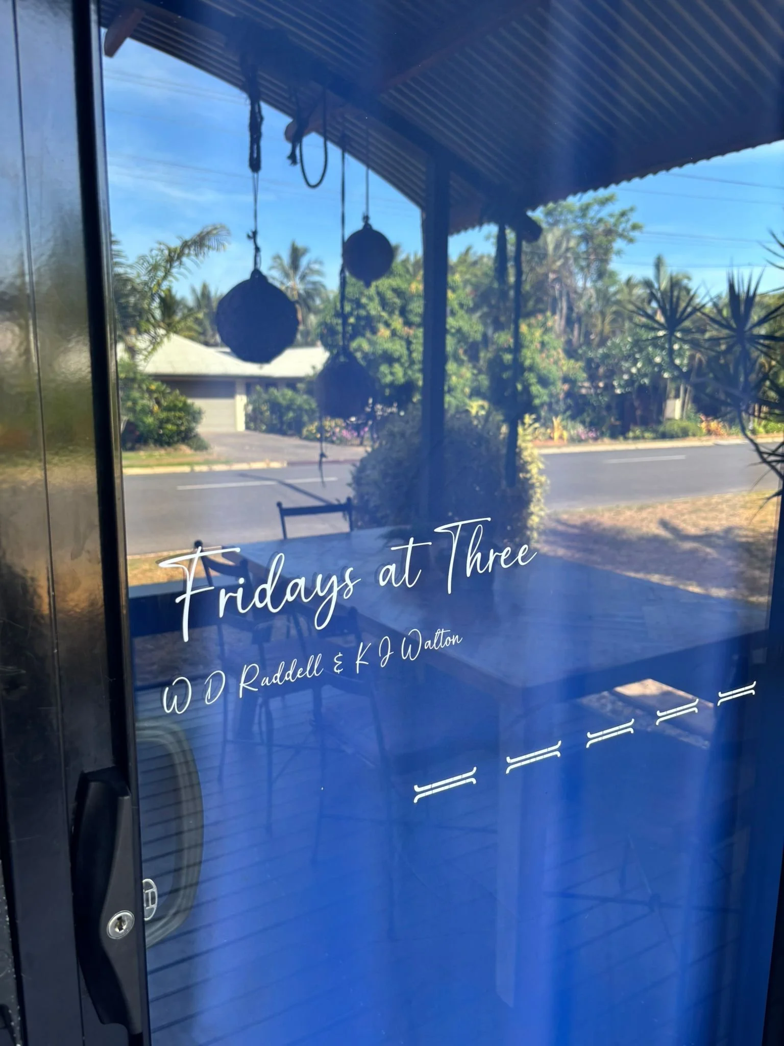 Fridays at Thee signwritten on front door