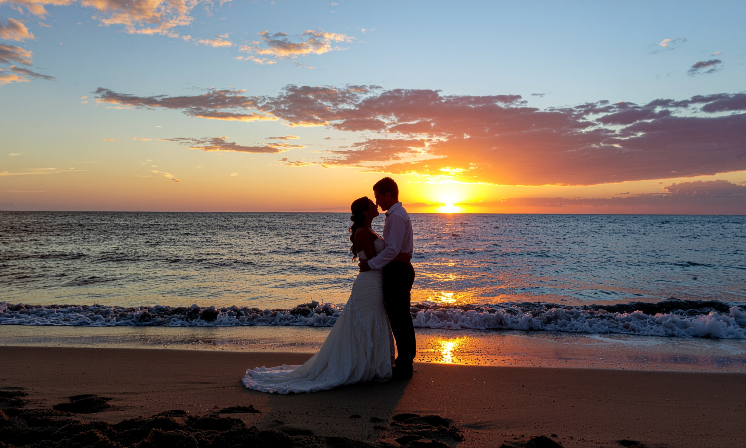 Romantic beach wedding setup for a destination wedding and honeymoon planned by a Northwest Indiana travel agent.