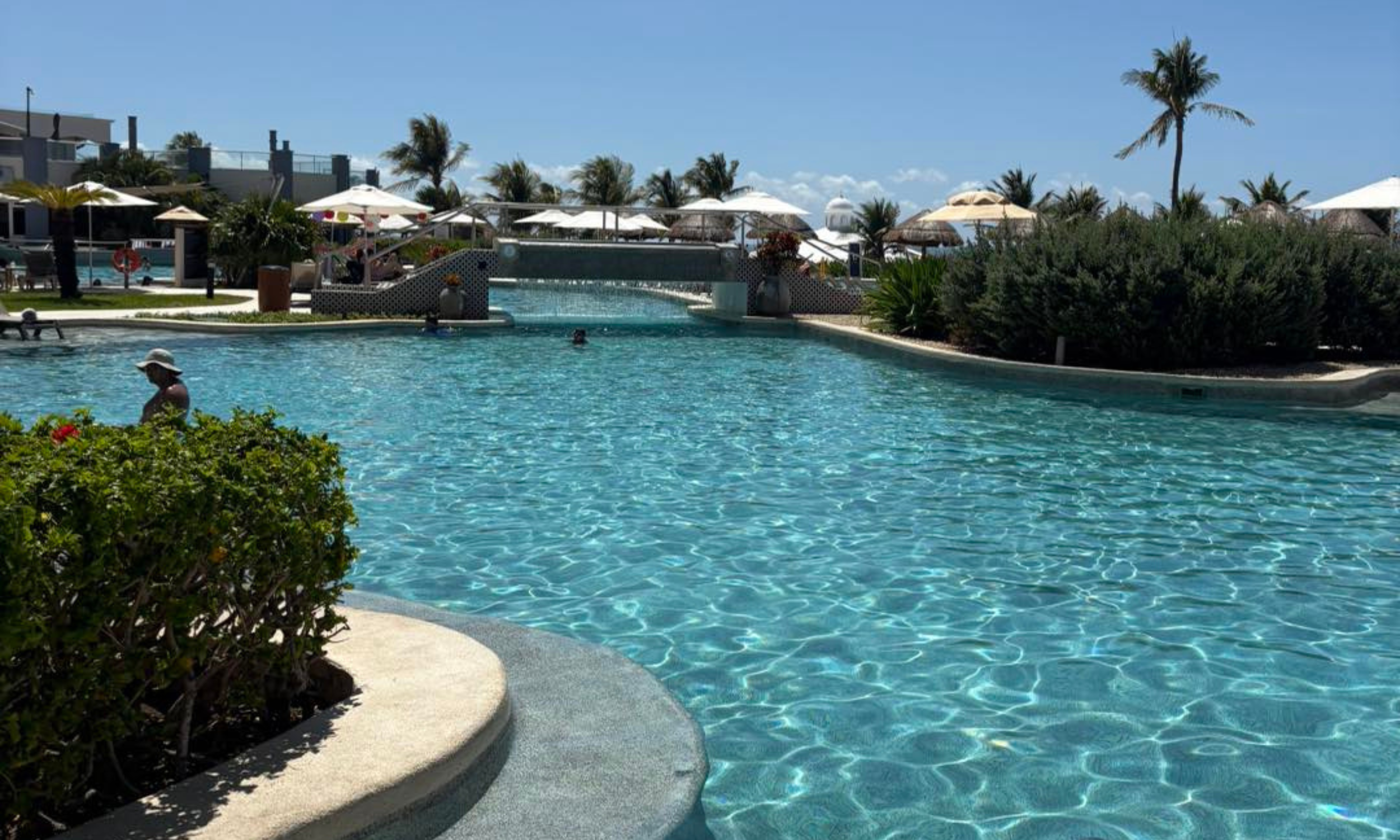 Luxury all-inclusive beach resort with pool and ocean view planned by a Northwest Indiana travel agent.