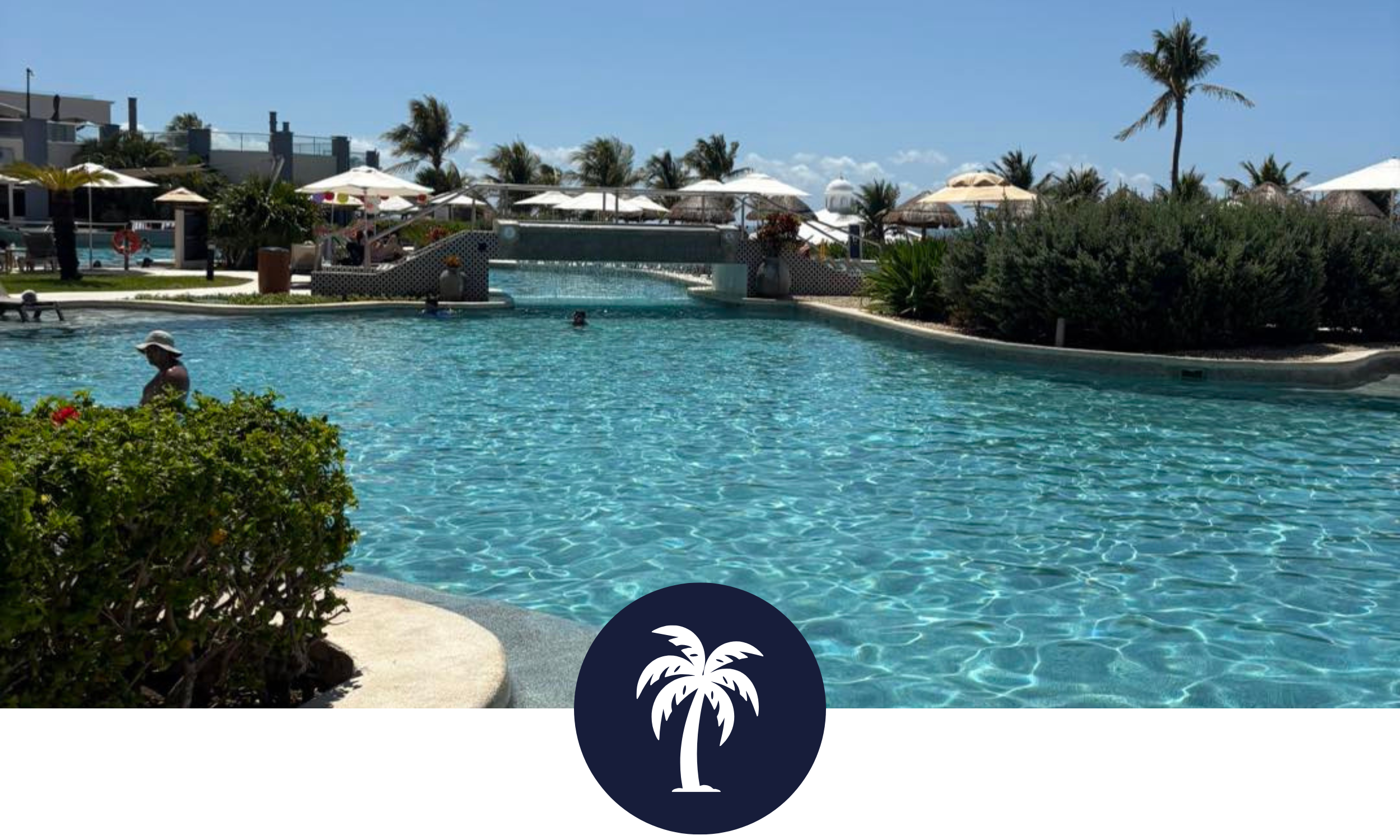 Luxury all-inclusive beach resort with pool and palm trees in Mexico or the Caribbean planned by a travel agent