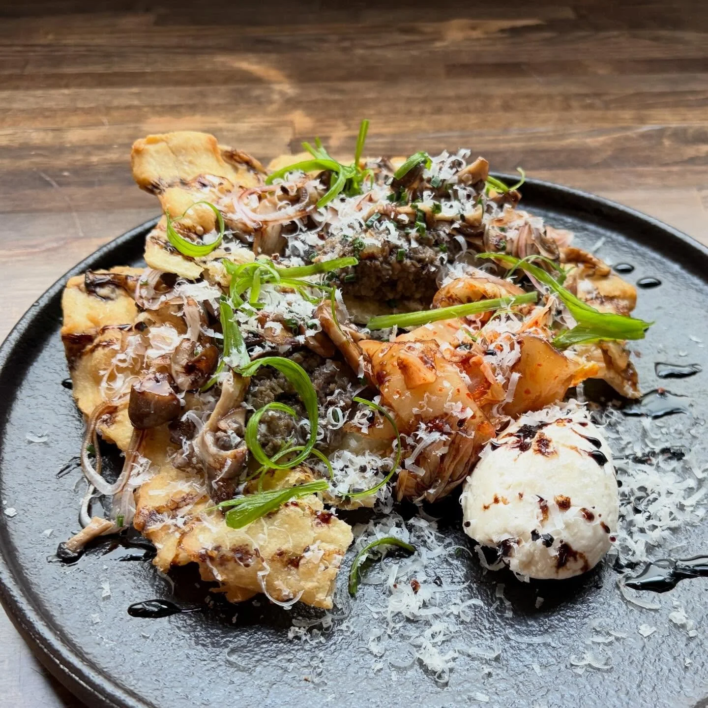 A new appetizer hitting the dinner menu. This is a mushroom toast- fry bread, mushroom duxelle, house miso ricotta  cheese, kimchi, balsamic soy reduction. Tonight is the last night to get the shrimp and grits!