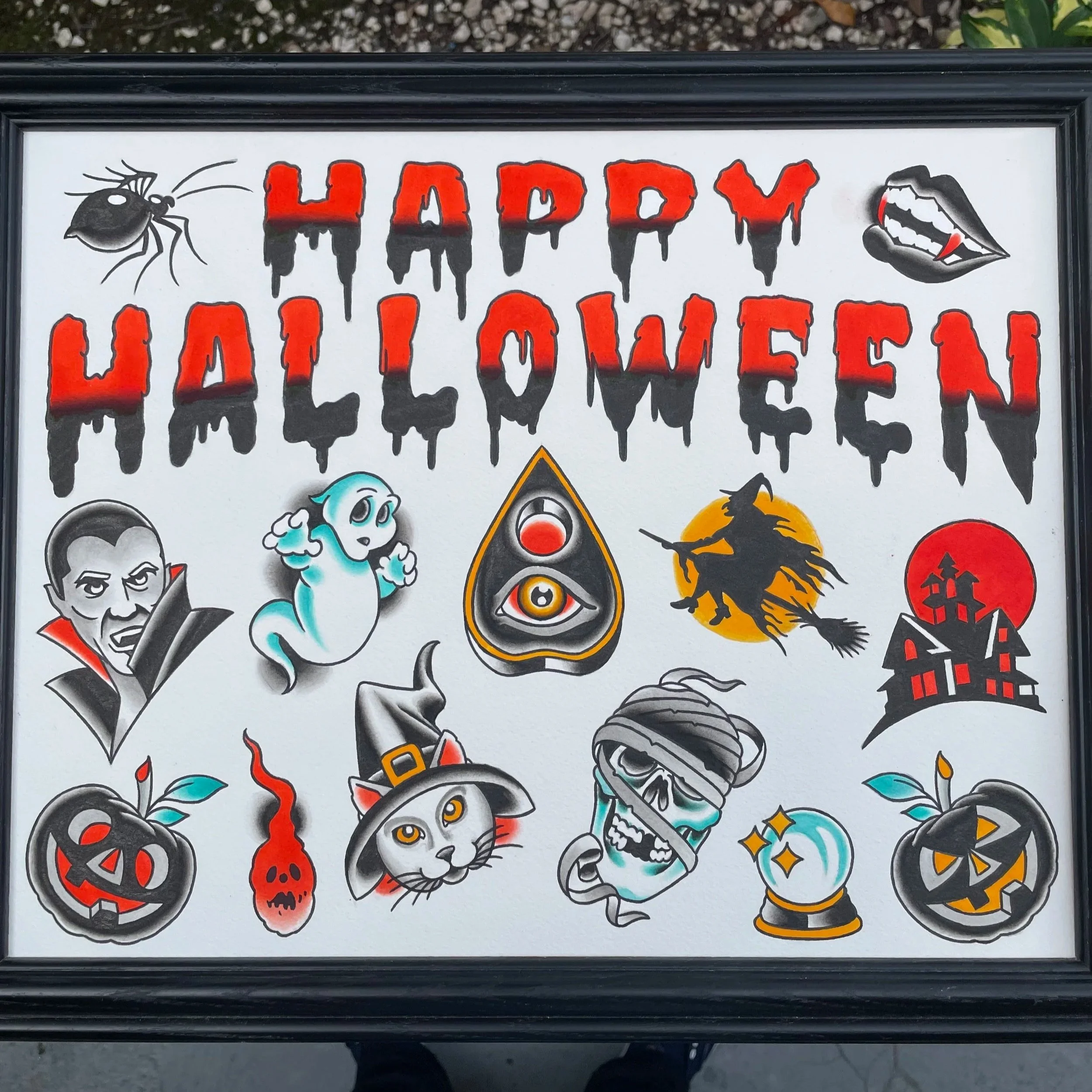 Hand-painted Halloween tattoo flash sheet with 13 traditional designs at Big Kahuna Tattoo in Boca Raton, FL