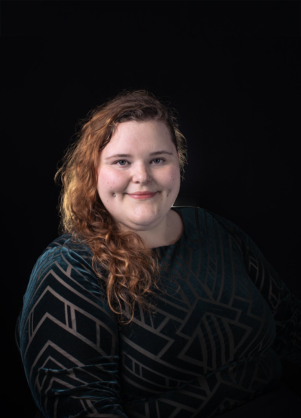 Crystal Foss sitting for a studio self-portait.