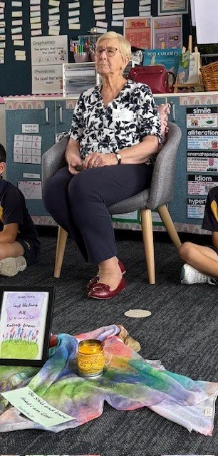 Sr Antoinette rsm leading prayer and reflection with school students.