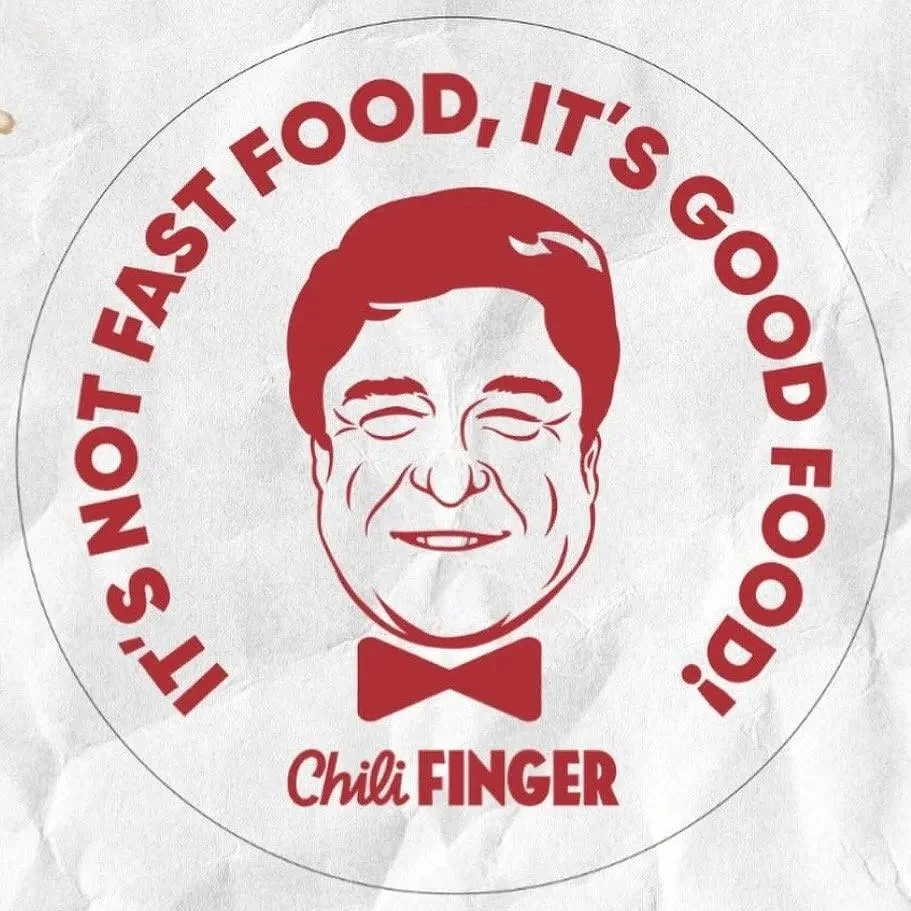Illustration of a smiling man with glasses and a bow tie, surrounded by the text "It's not fast food, it's good food!" and "Chili Finger."