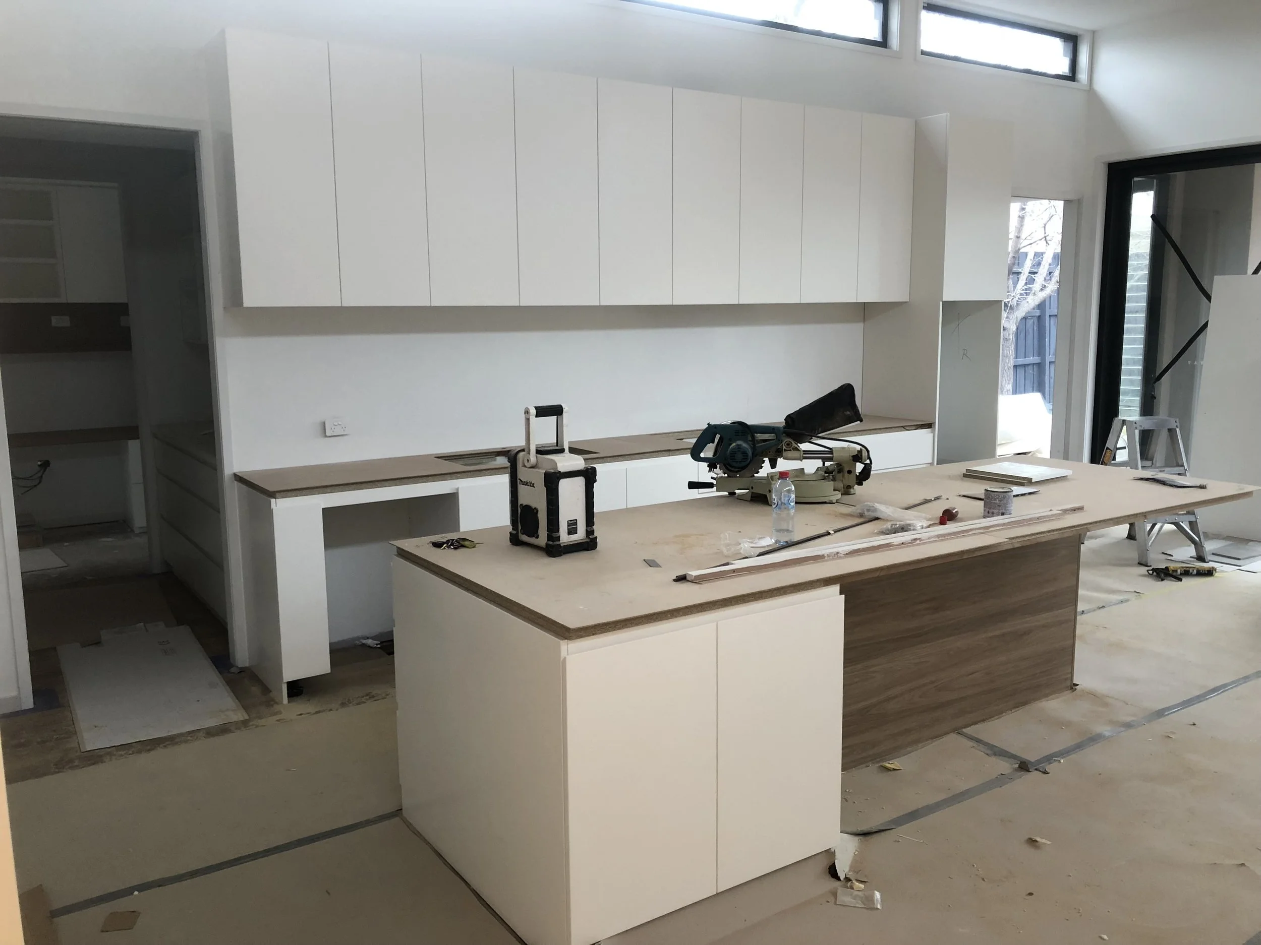 Modern kitchen installation Melbourne island bench and cabinetry fit-off