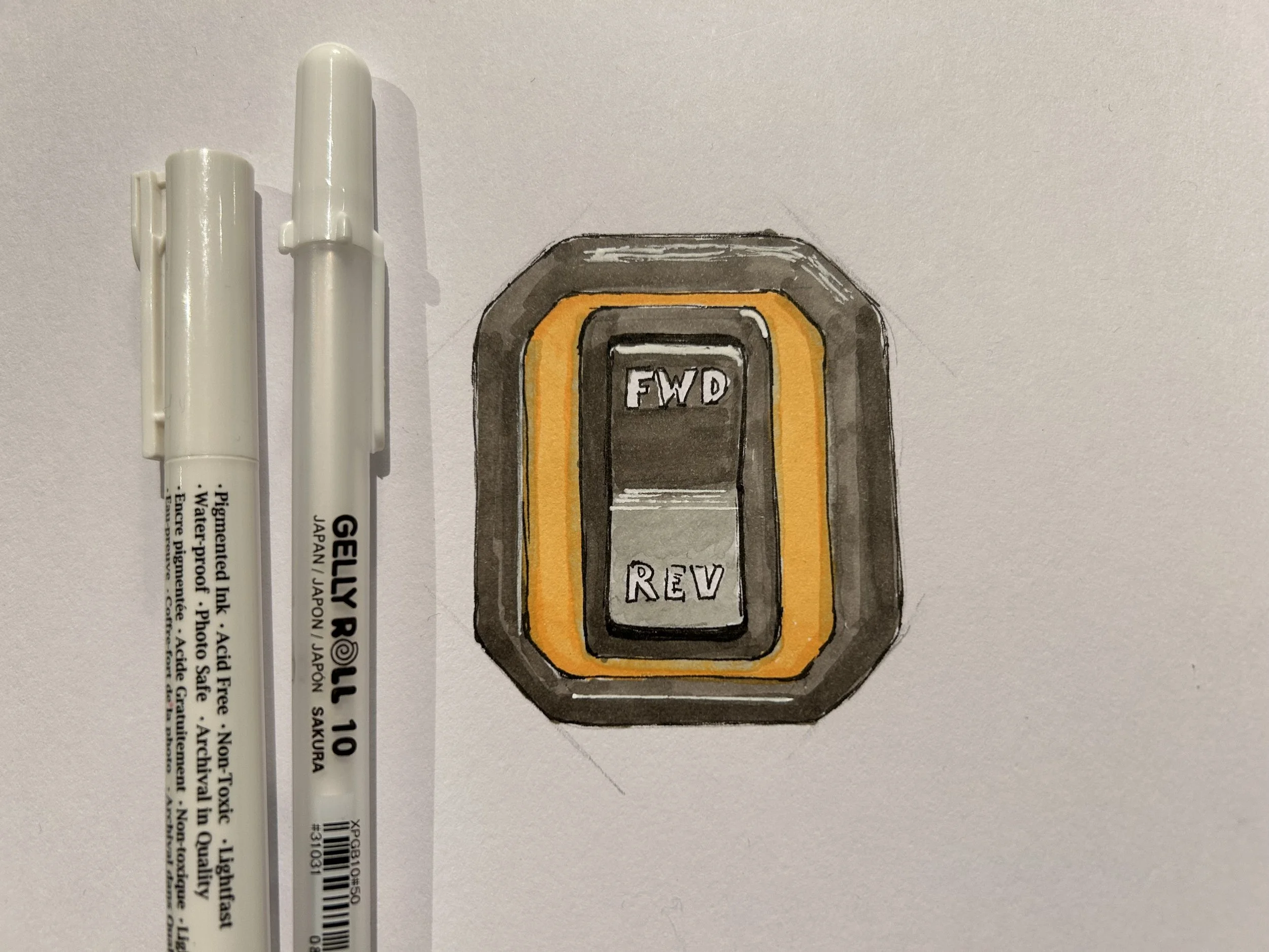 Håndskisse av switch lock bryteradapter med gul aksentfarge