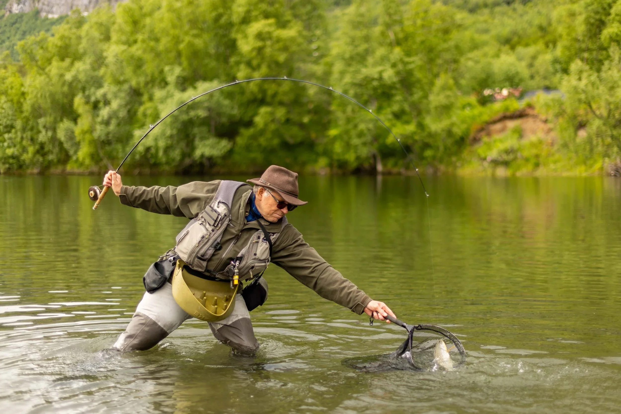 Alf (aka flyalf) netting a brown trout. Fun day!