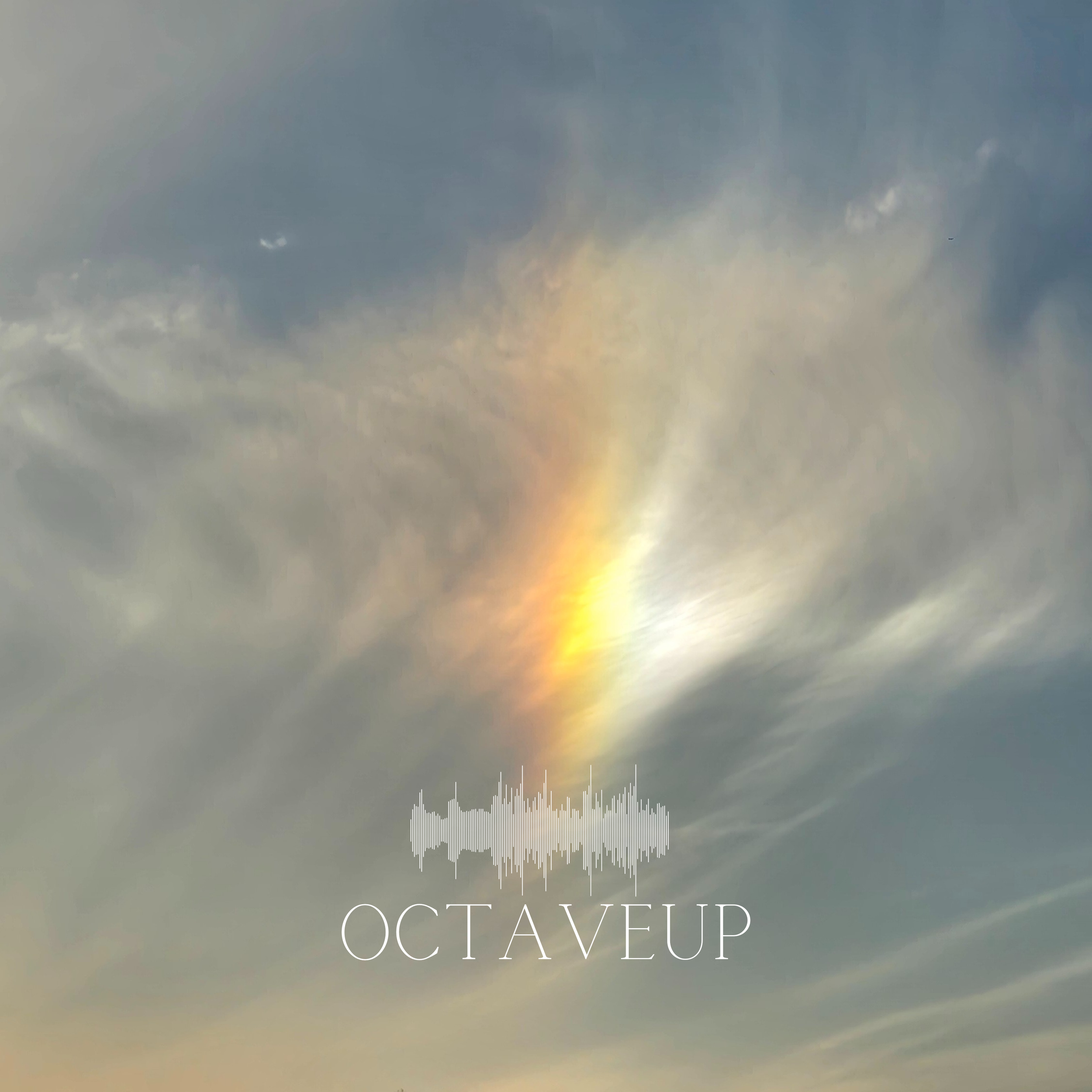 Cloudy sky with a small rainbow and the word 'OCTAVEUP' and a soundwave graphic overlay.