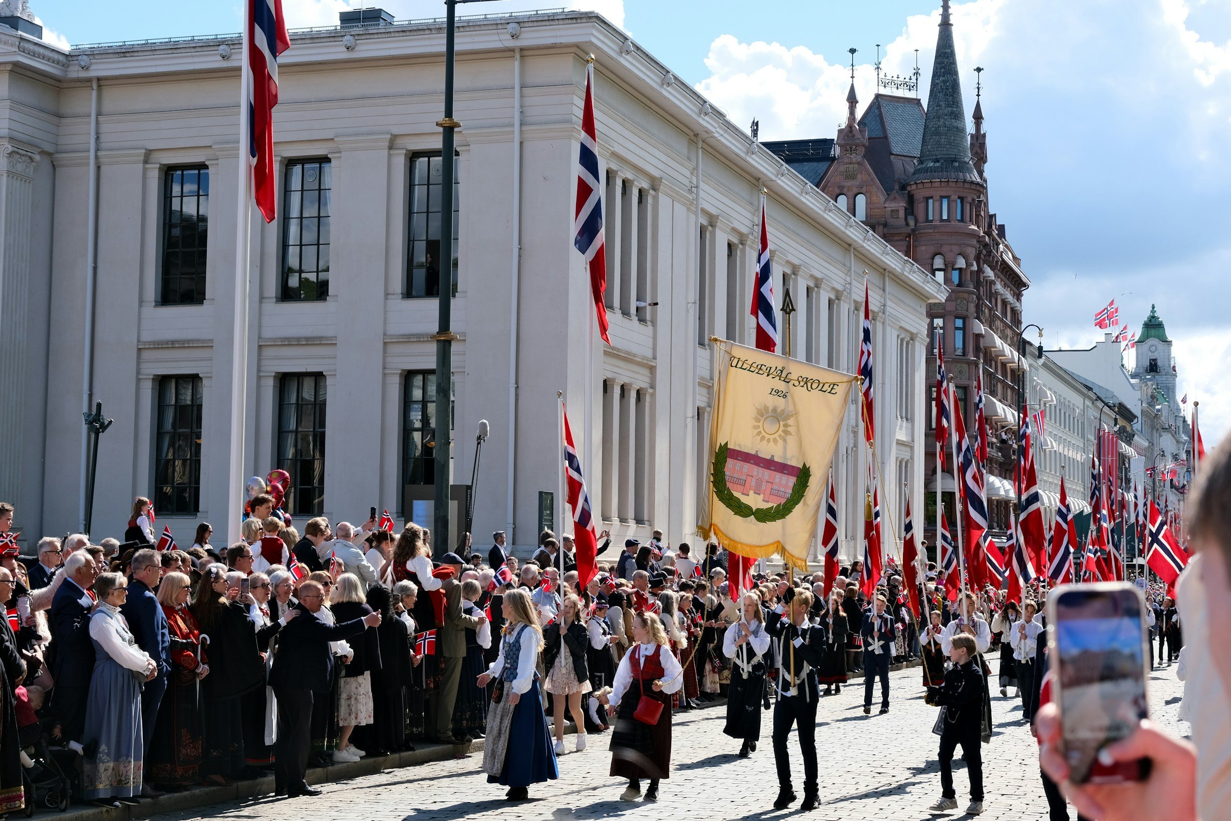 the 17th of may parade in Oslo Norway, people dressed in traditional clothing, also known as bunad.