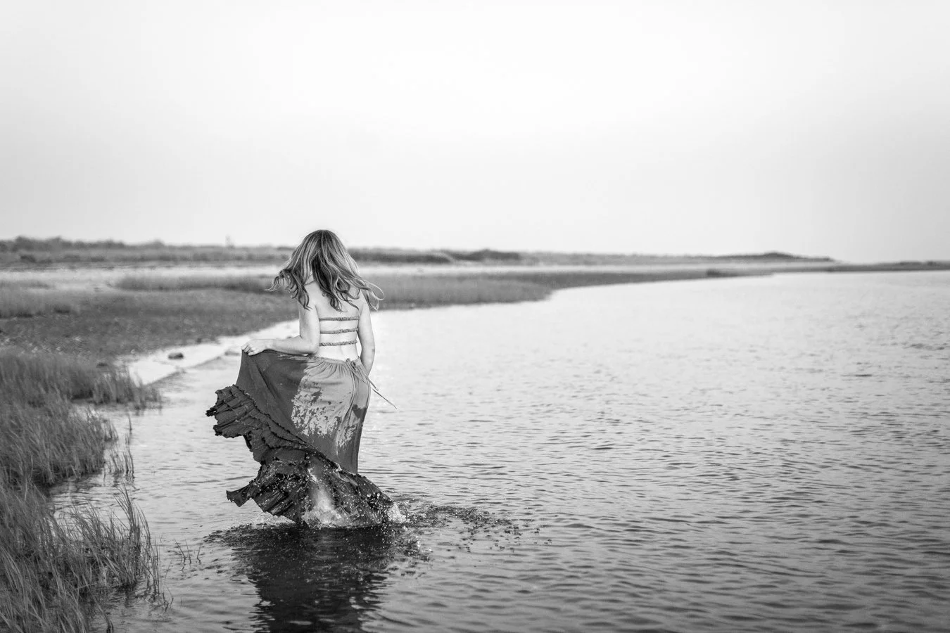Sunset senior photos at Duxbury Beach capturing soft golden light along the Massachusetts coast.