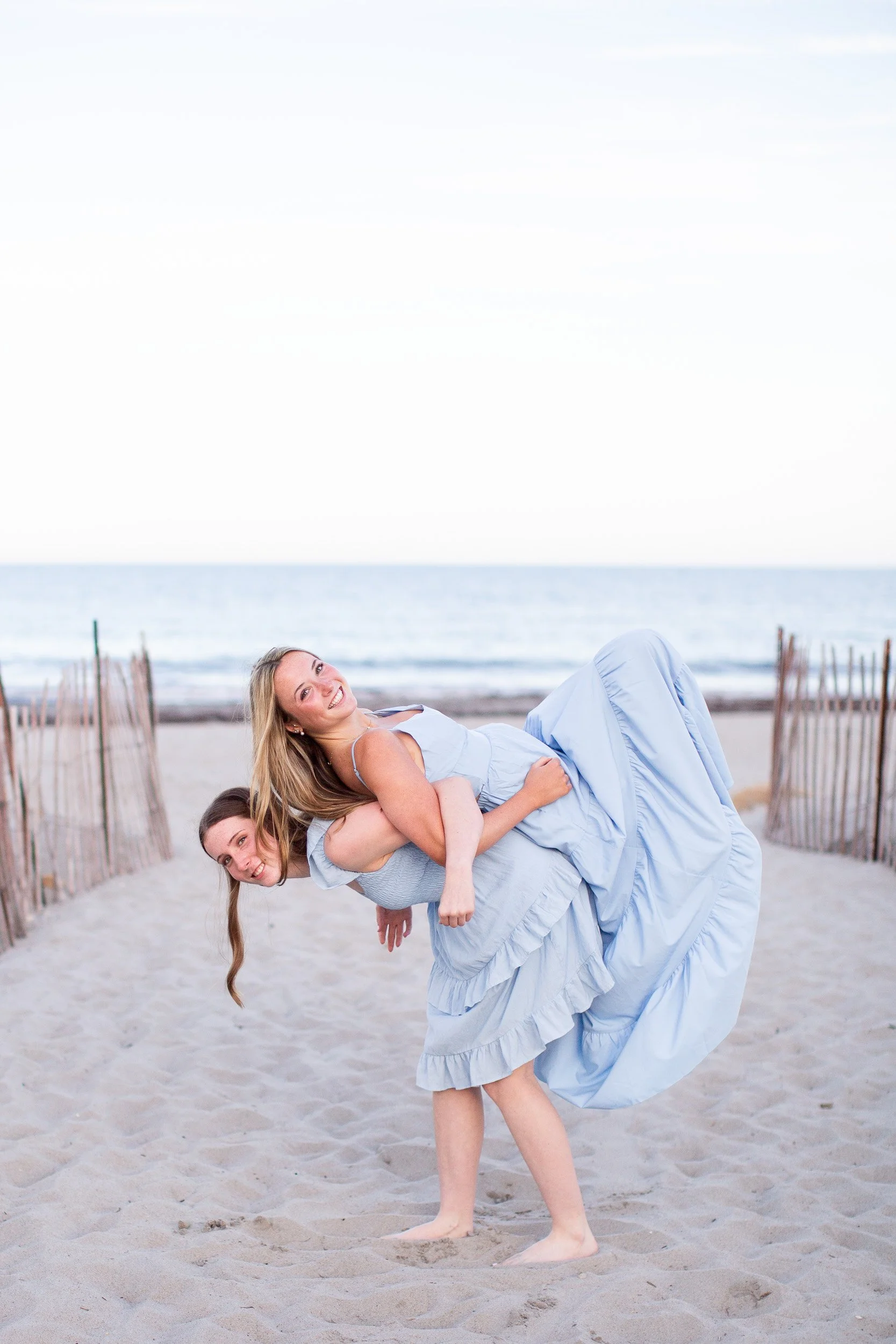 Twins photographed at Scarborough Beach for senior portraits