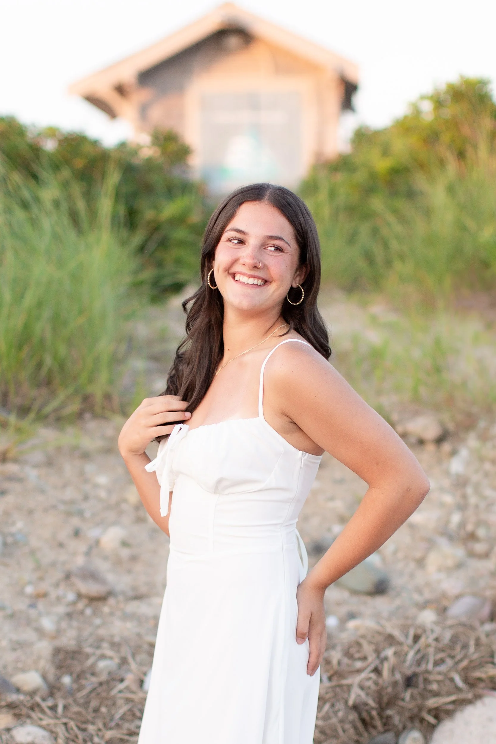 Easton MA senior photography session featuring Logan on the beach at sunset.