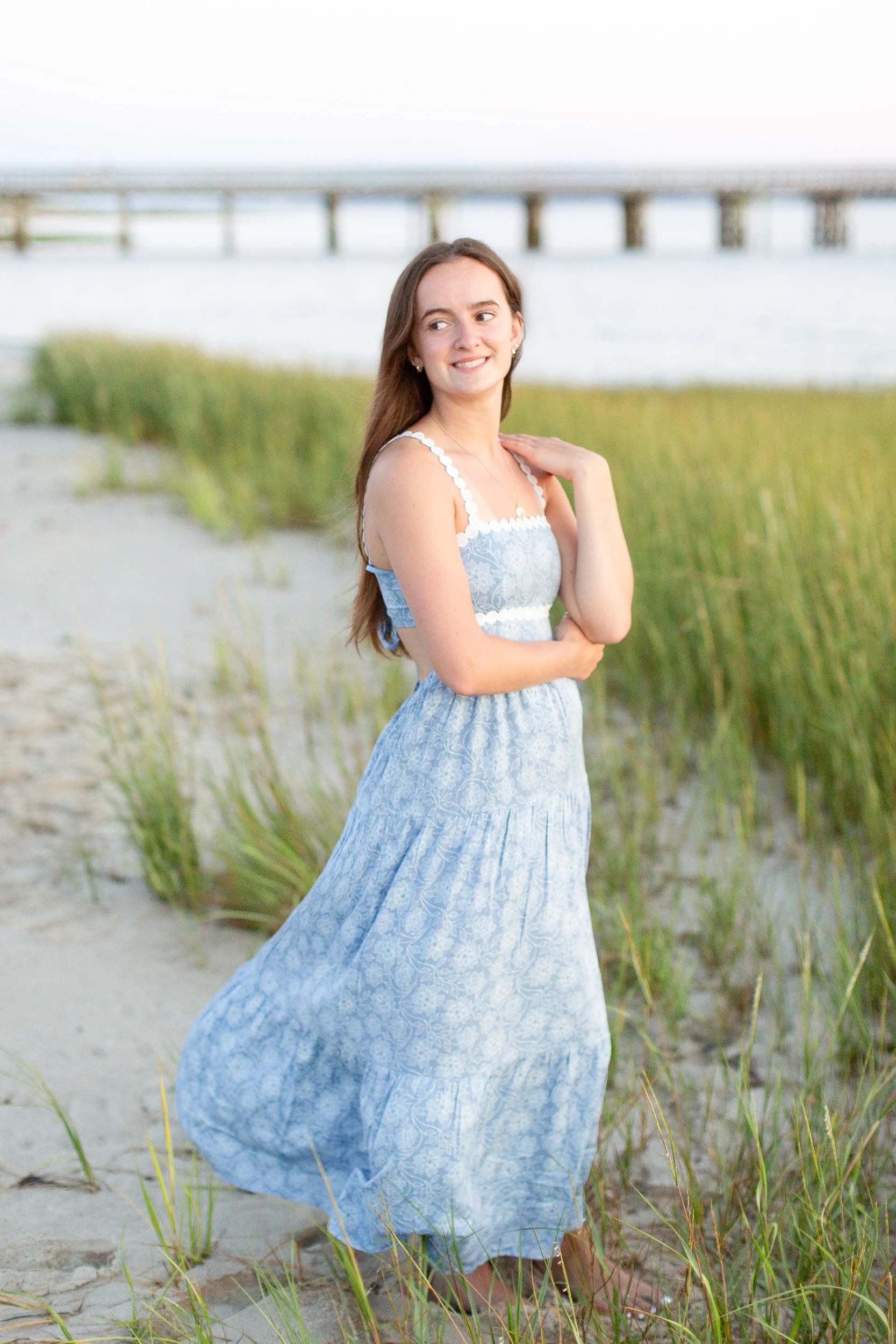 Senior portrait at sunset on Duxbury Beach on the South Shore of Massachusetts