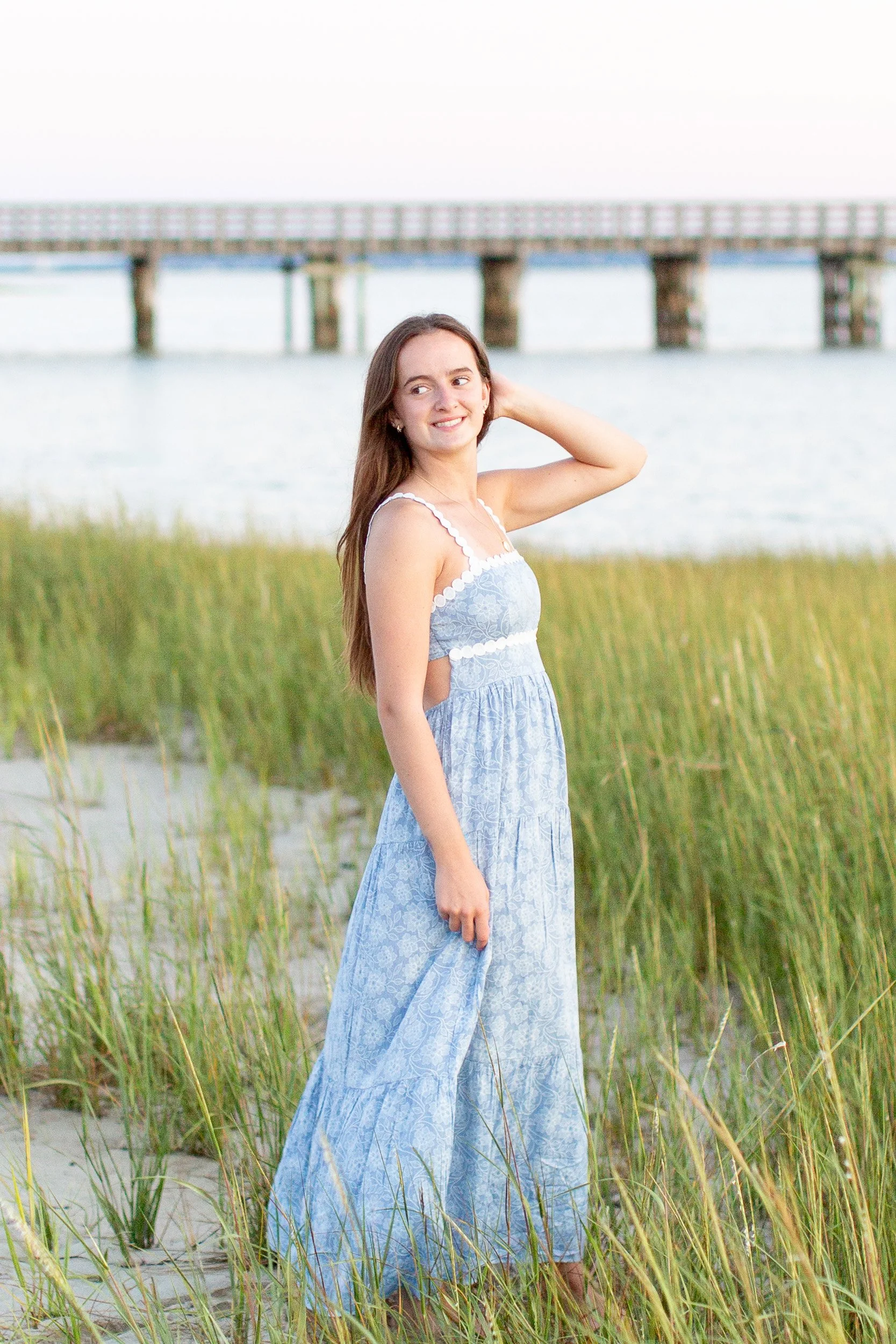High school senior on Duxbury Beach at golden hour
